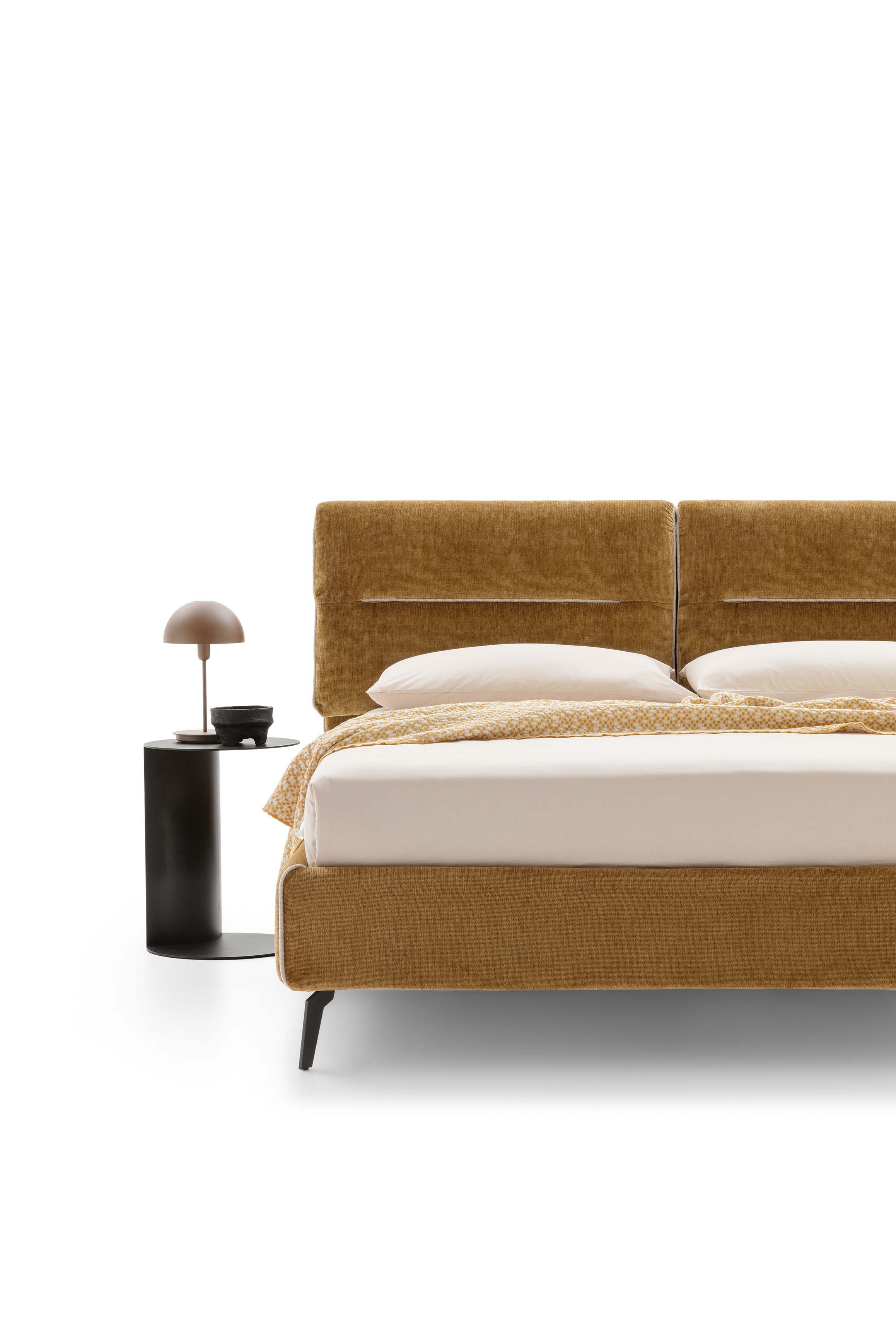 Detail of the Academy bed headboard with cushions featuring horizontal quilting