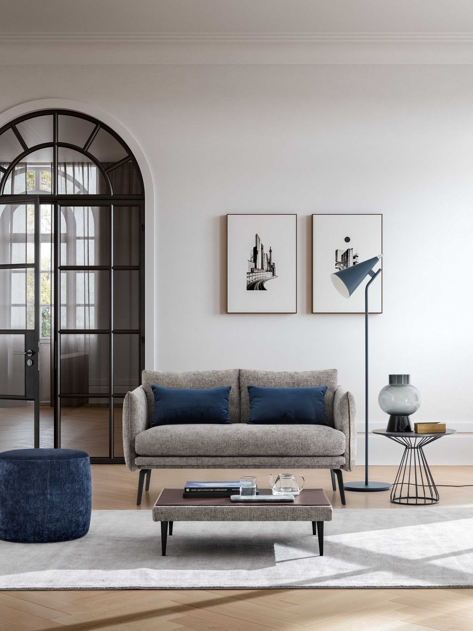 Light gray two-seater loveseat with midnight blue cushions