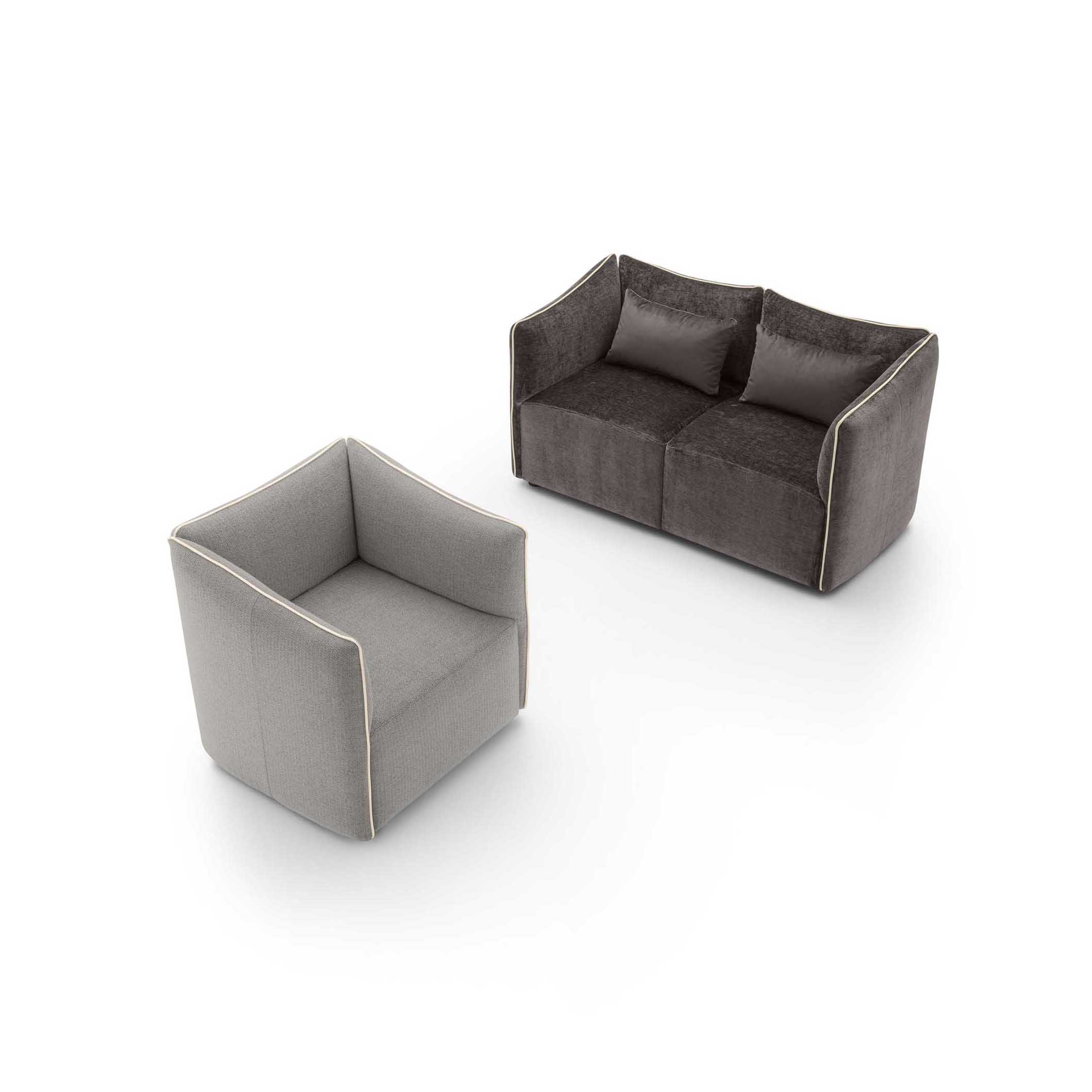 Dark gray two-seater loveseat with contrasting perimeter piping