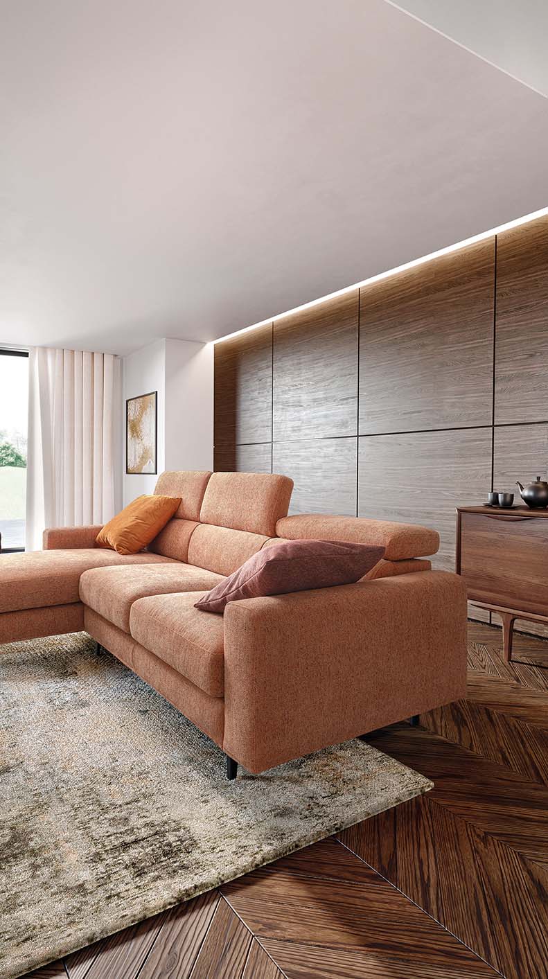 Detail of the corner section of a sofa with extended headrests. Comfortable seat