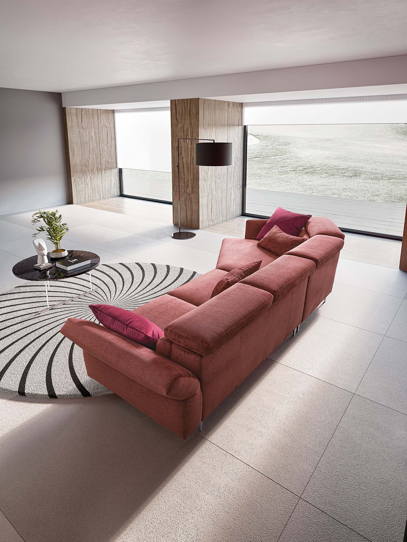 Modern living room composed of a corner sofa with asymmetrical corner section
