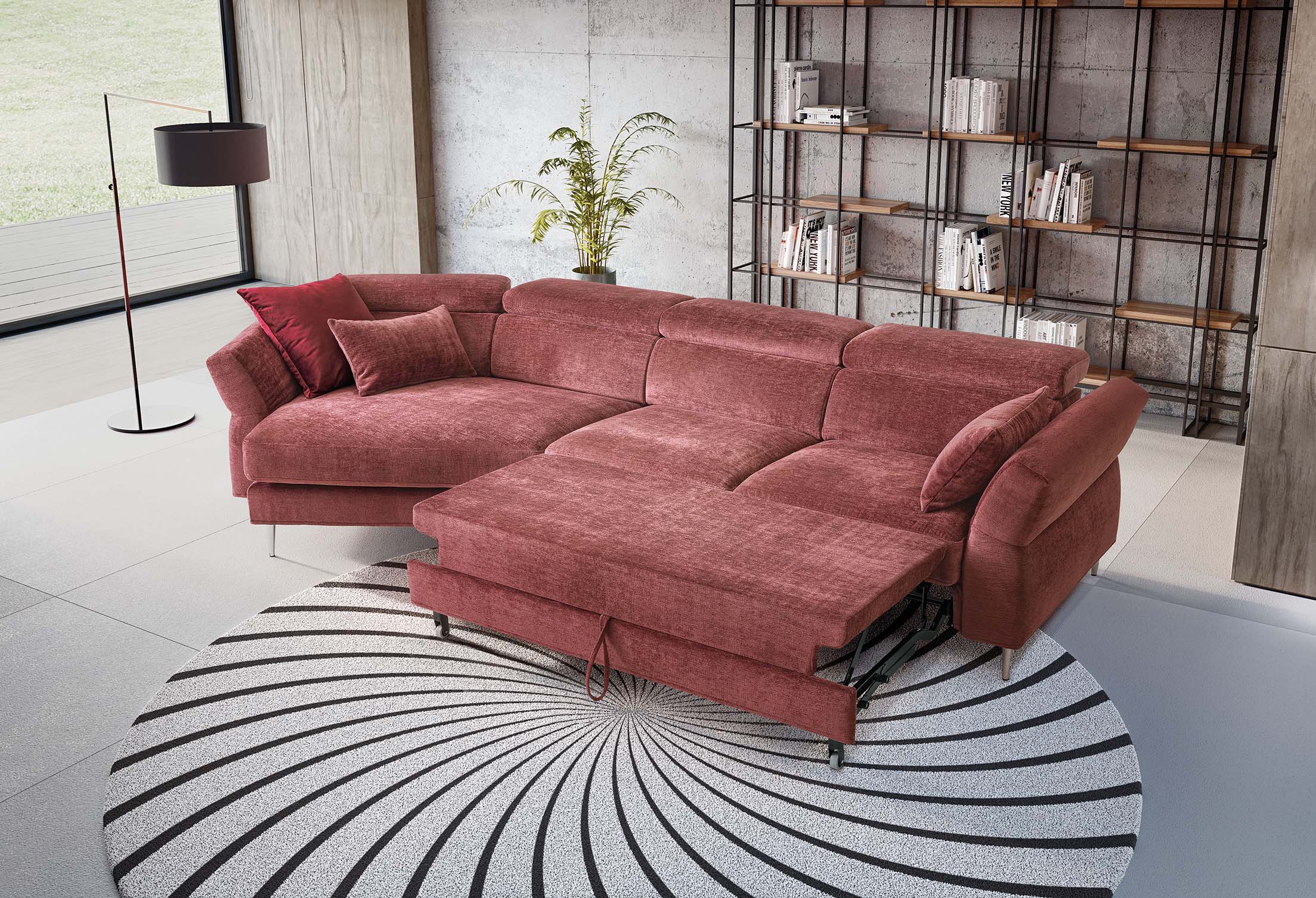 Red sectional sofa with pull-out footrest platform and adjustable headrests