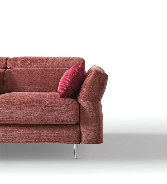Detail of the seat and adjustable armrest of a sofa with adjustable headrests