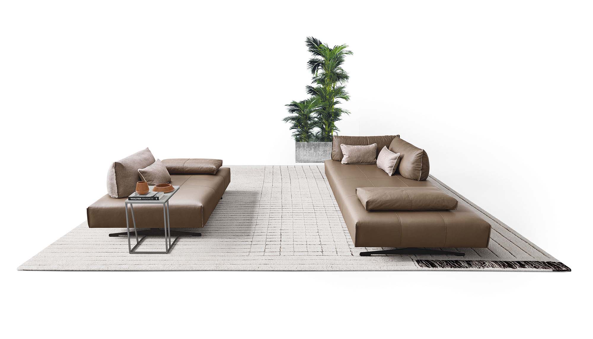 Modular brown leather sofa configured as two separate islands
