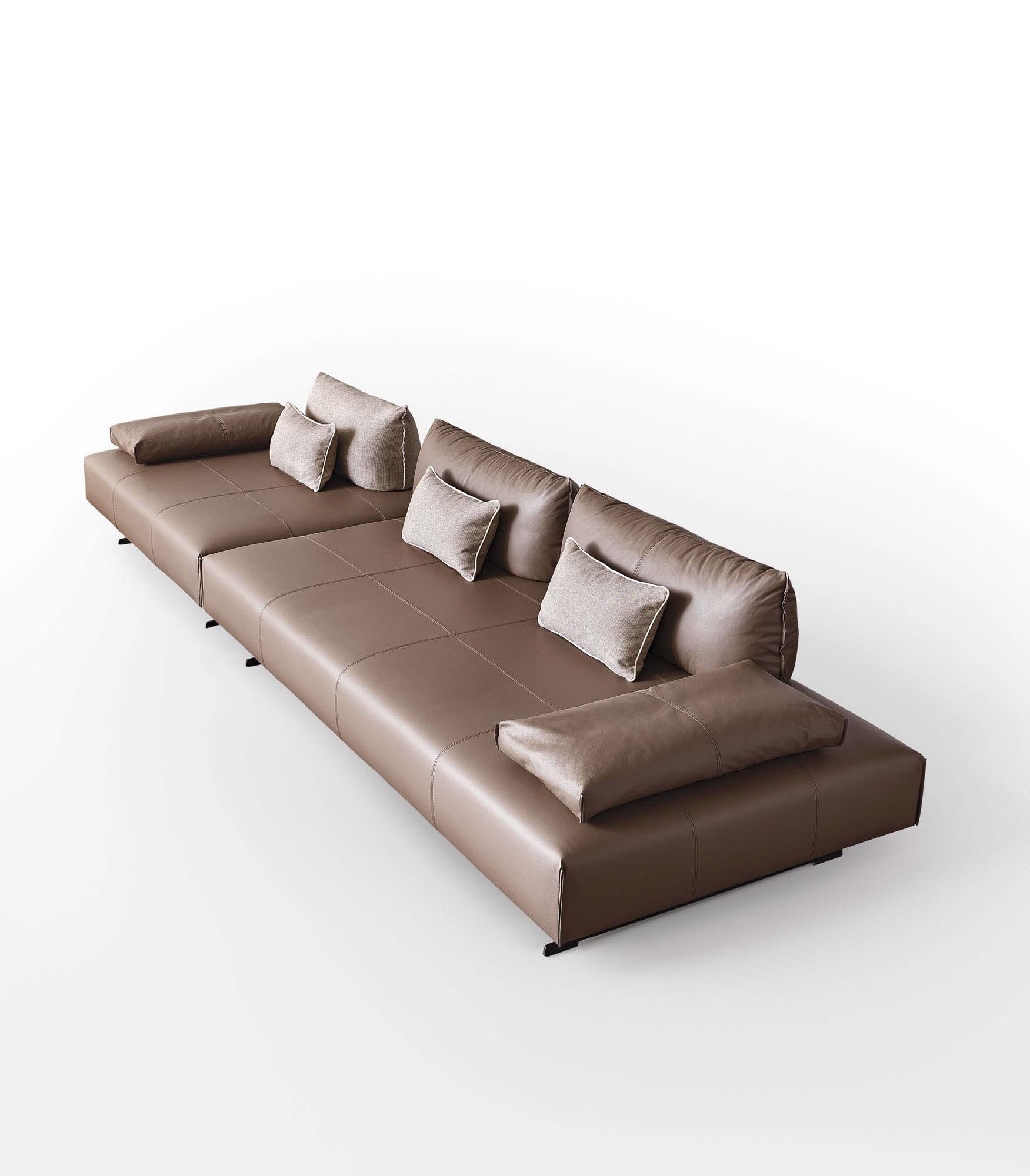 Modular brown leather sofa in a linear and design configuration