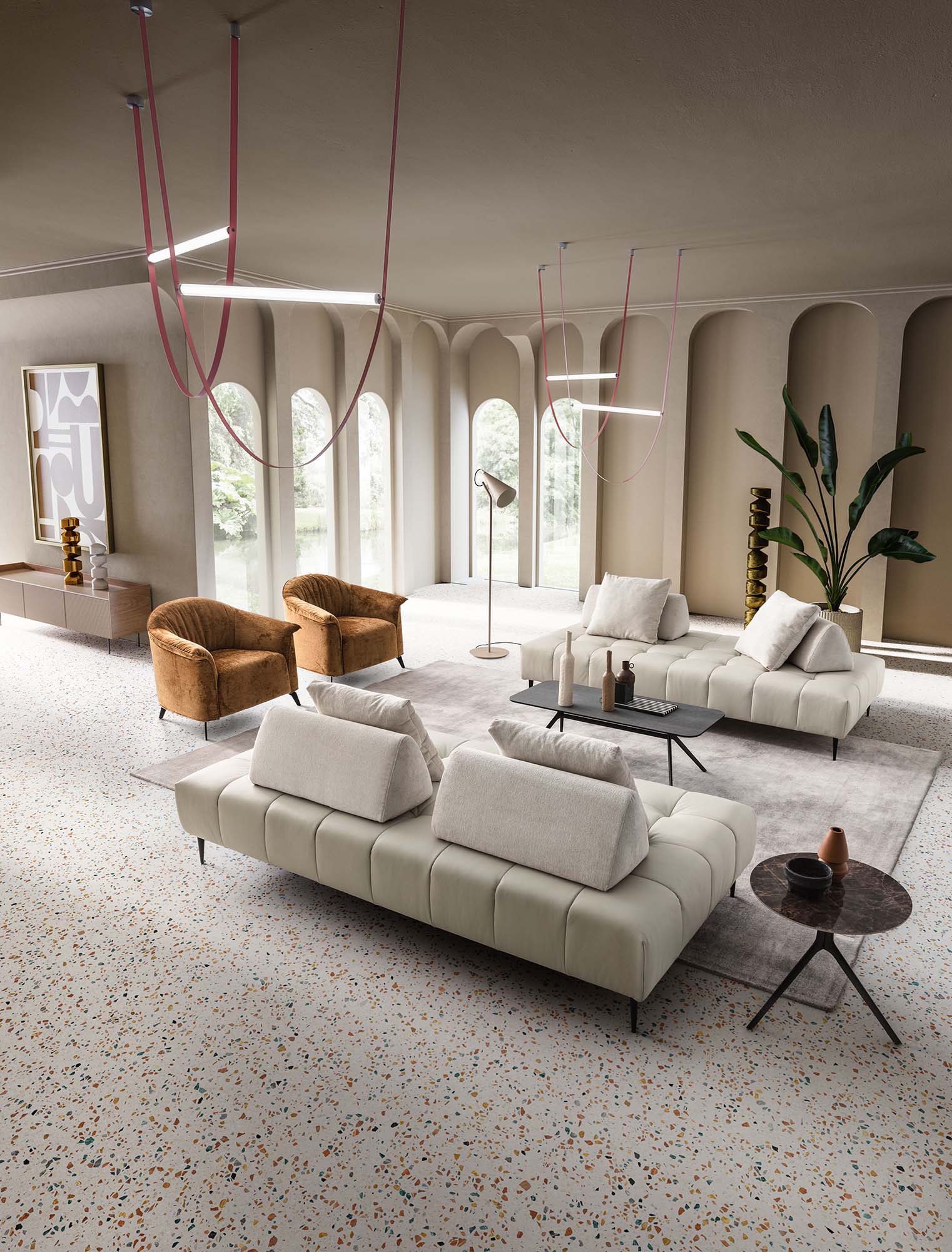 Living room composed of two single modules of the Bowie sofa with sliding backrests. Fabric in Nizza 286 color