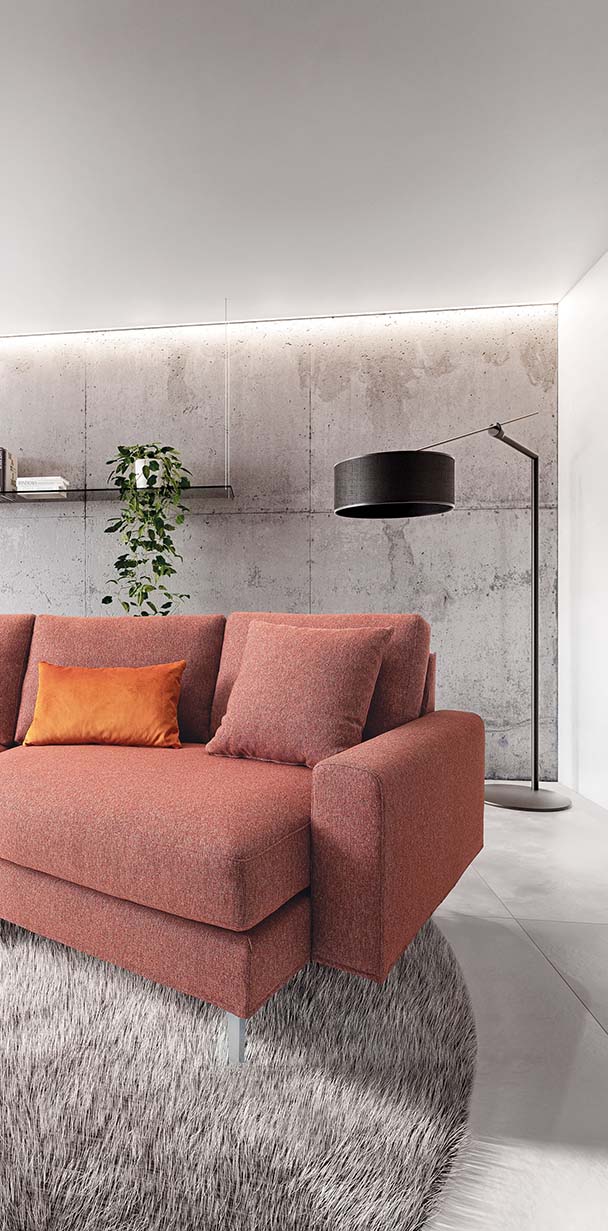 Close-up view of the asymmetrical seat and armrest of a sofa