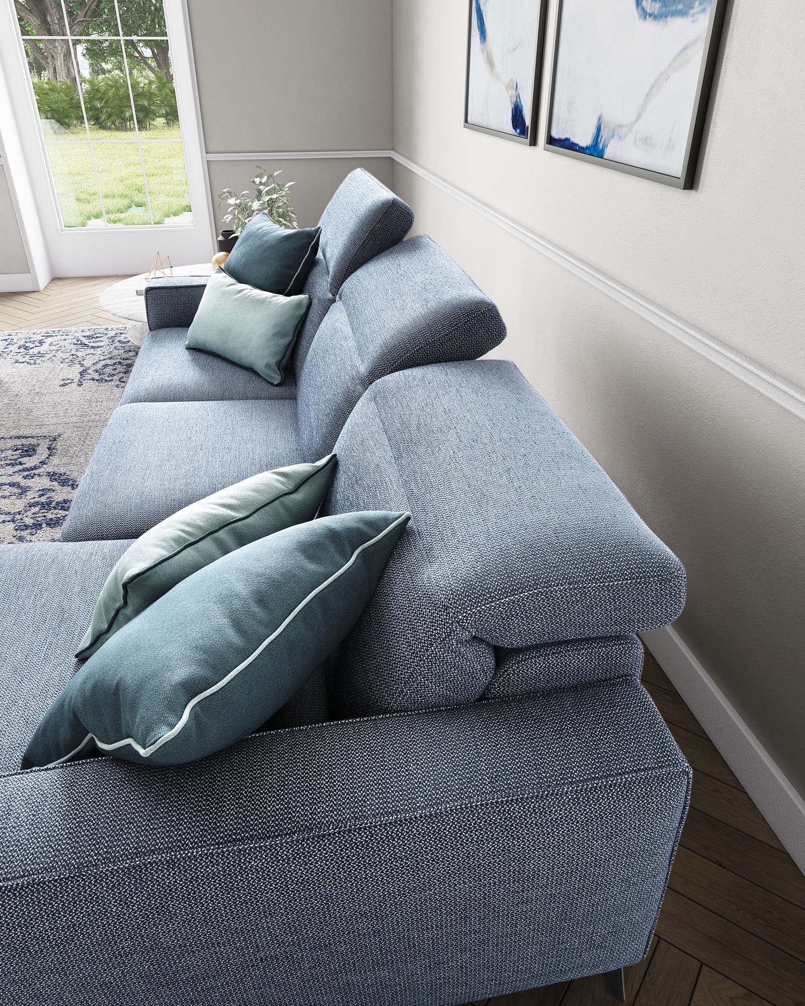 Comfortable light blue sofa with adjustable headrests