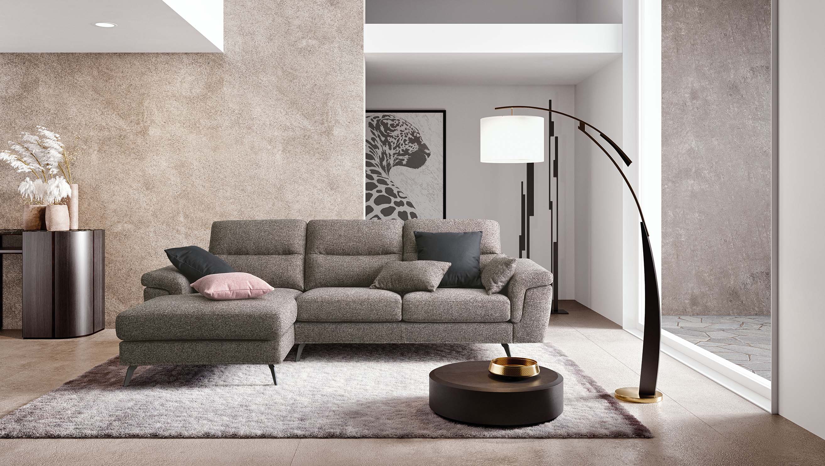 Elegant gray sofa with side chaise longue and rounded armrests