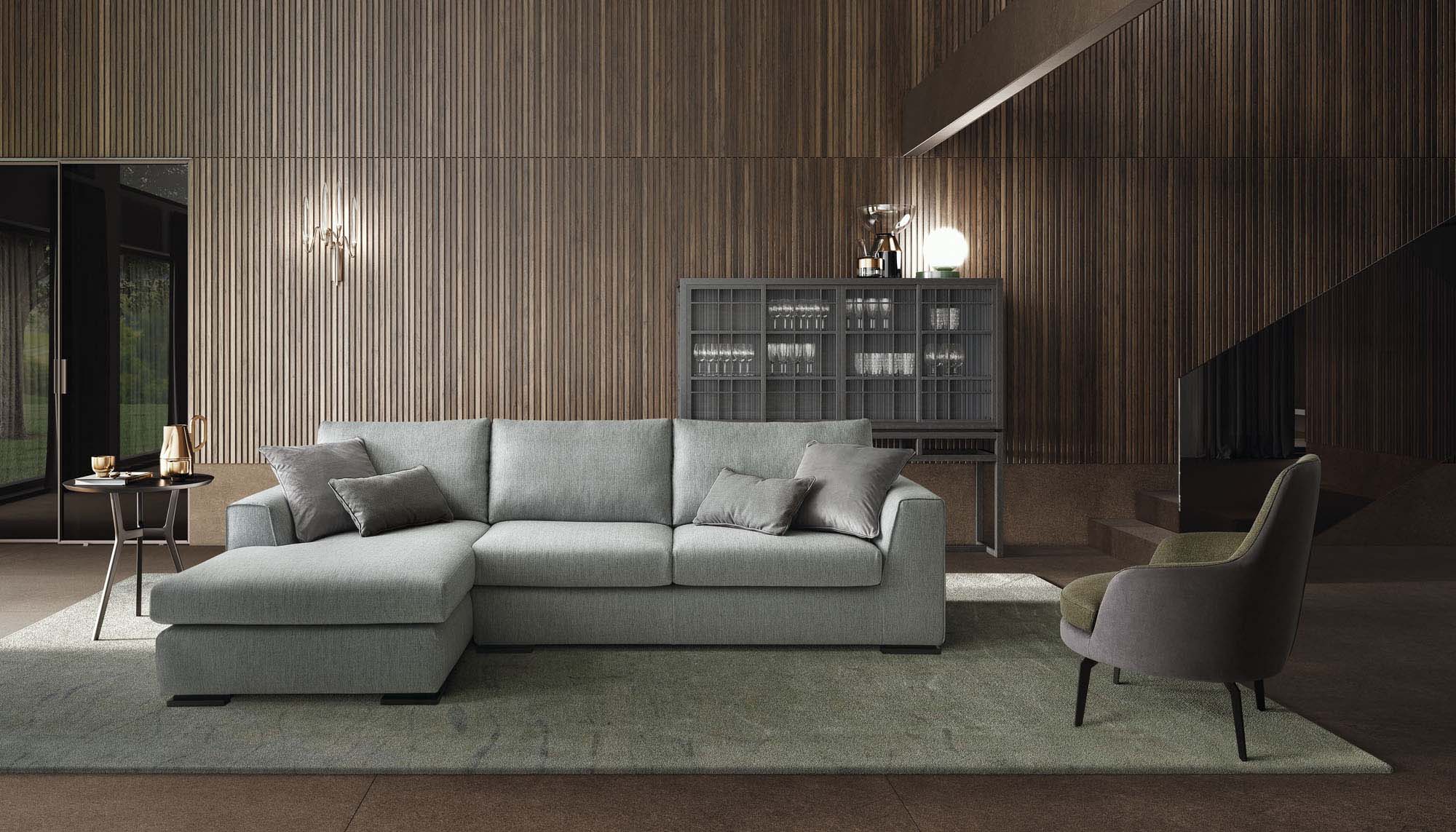 Modern wooden living room furnished with a low modern grey-blue chaise longue sofa