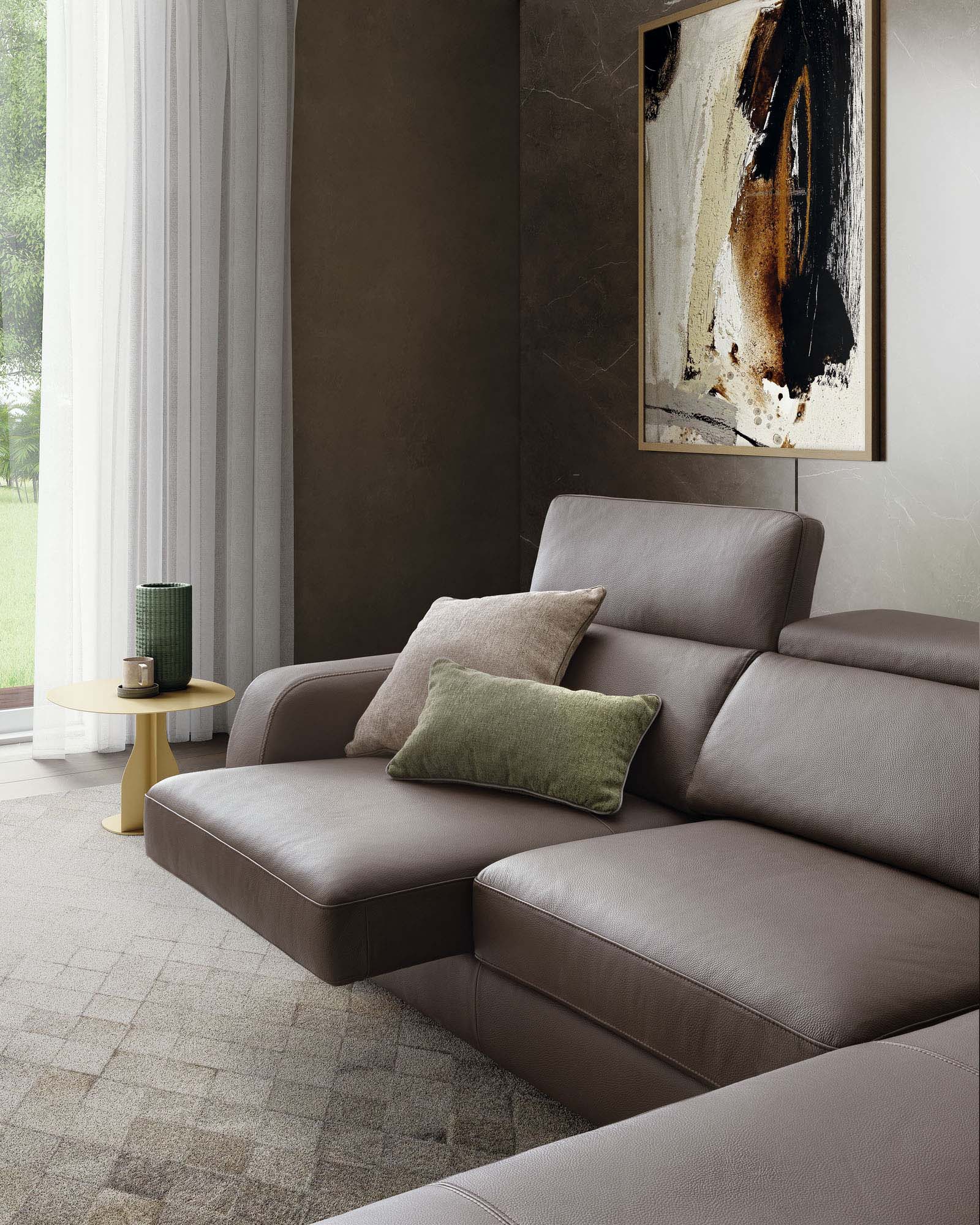 Elegant brown leather sofa with pull-out seat and adjustable headrest