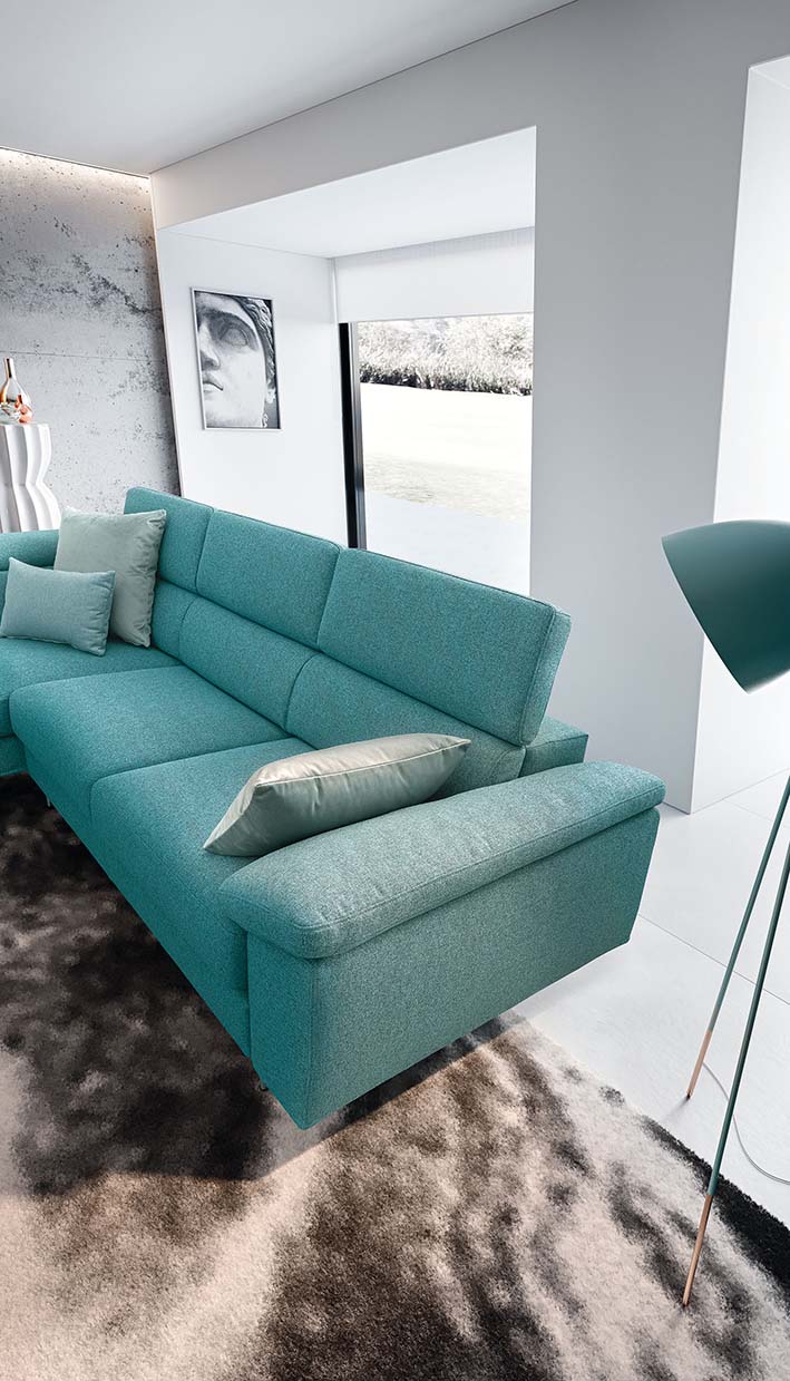 Adjustable headrests extended in a turquoise light blue upholstered linear sofa
