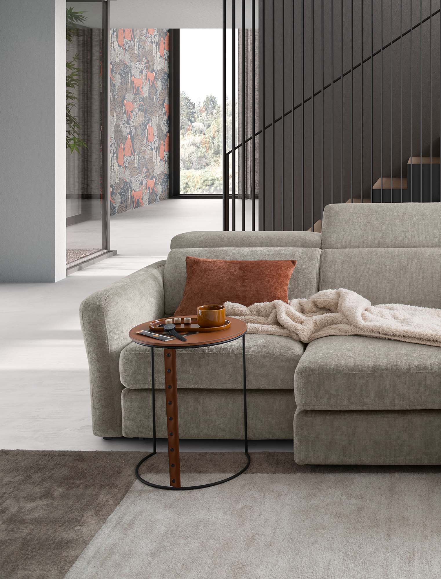 Sofa with Corinne 004 LeComfort upholstery with a nesting coffee table. Adjustable headrests and contrasting cushion