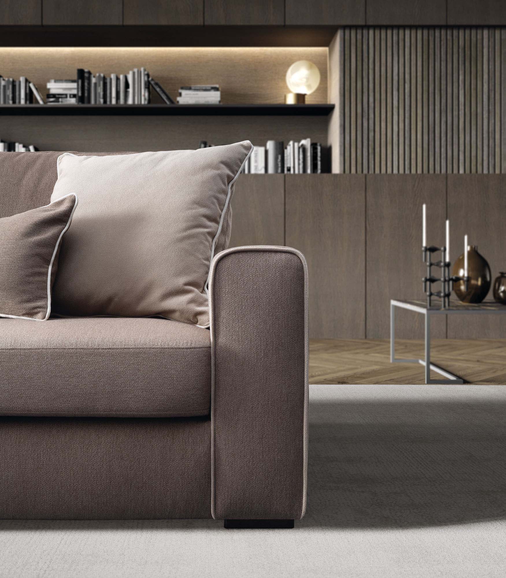 Detail of the Icaro sofa armrest with piping