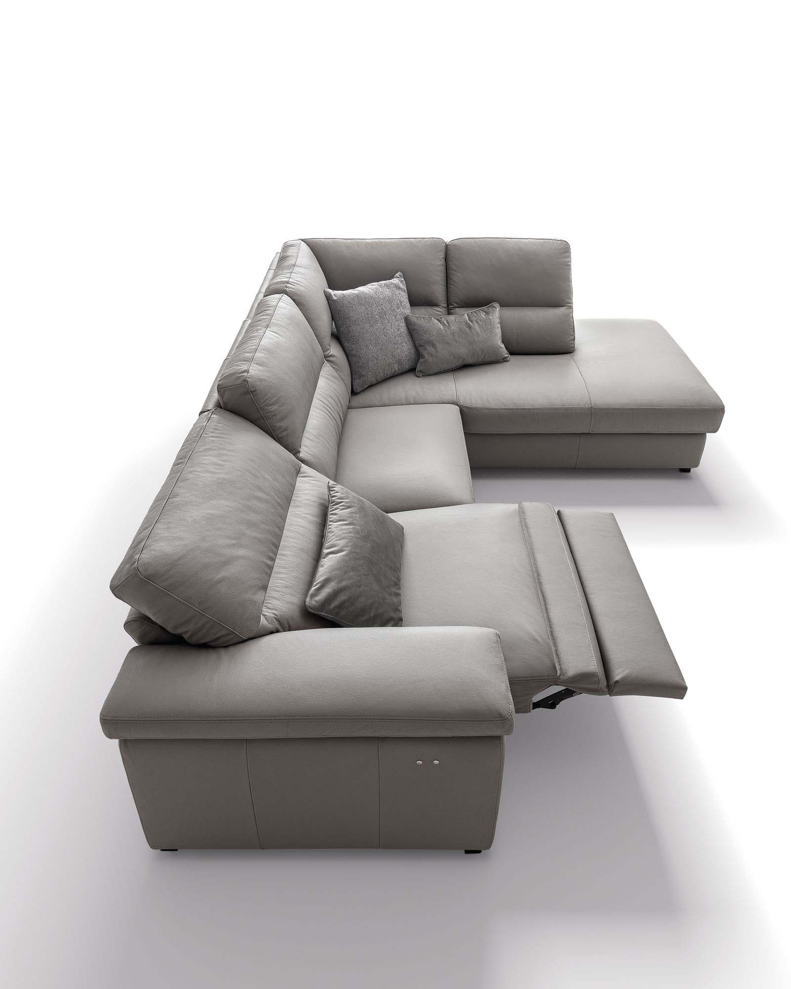 Three-seater leather sofa with reclining mechanism and chaise longue