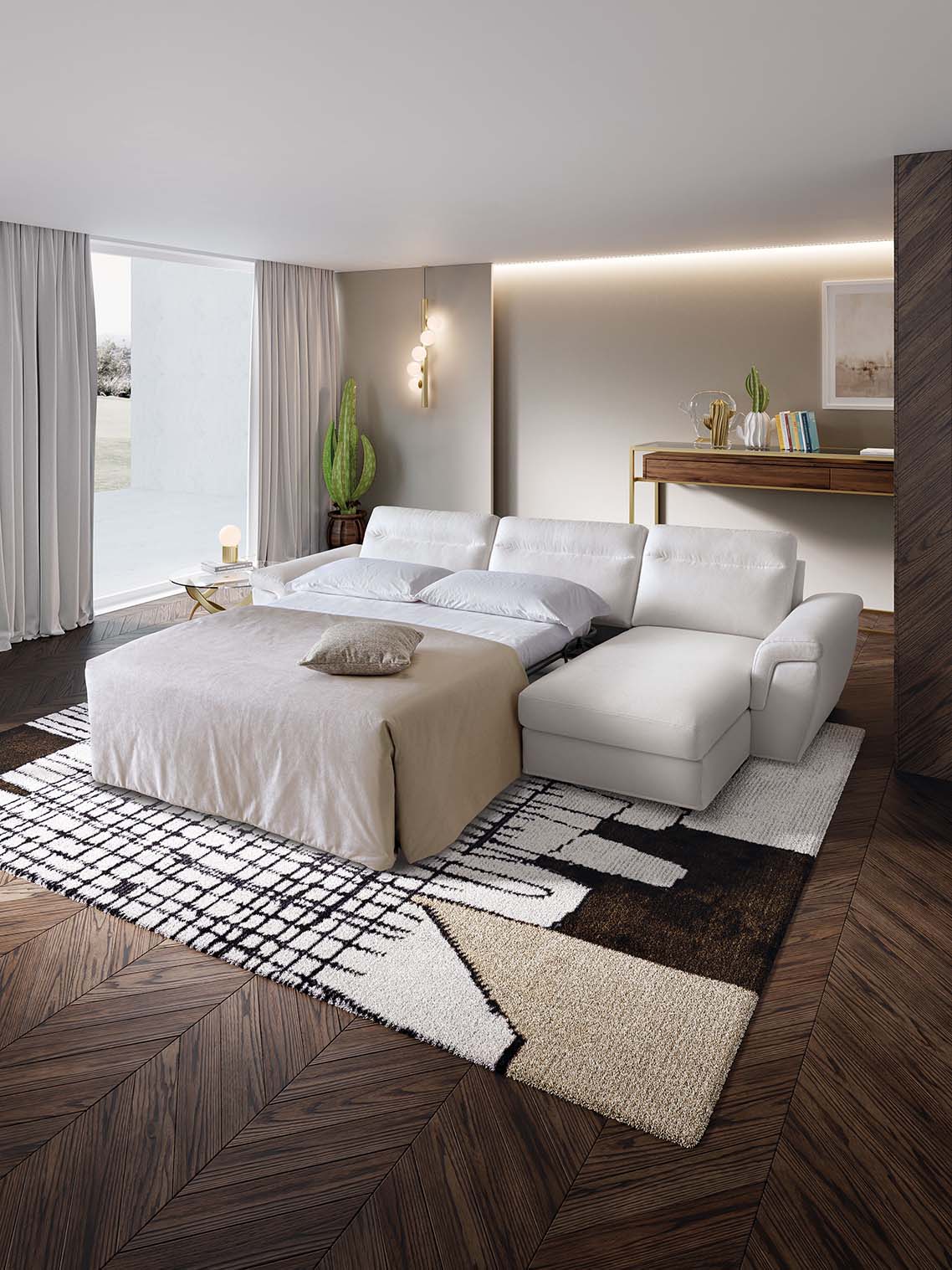 Three-seater Kallima sofa with chaise longue becomes a comfortable bed thanks to the pull-out platform