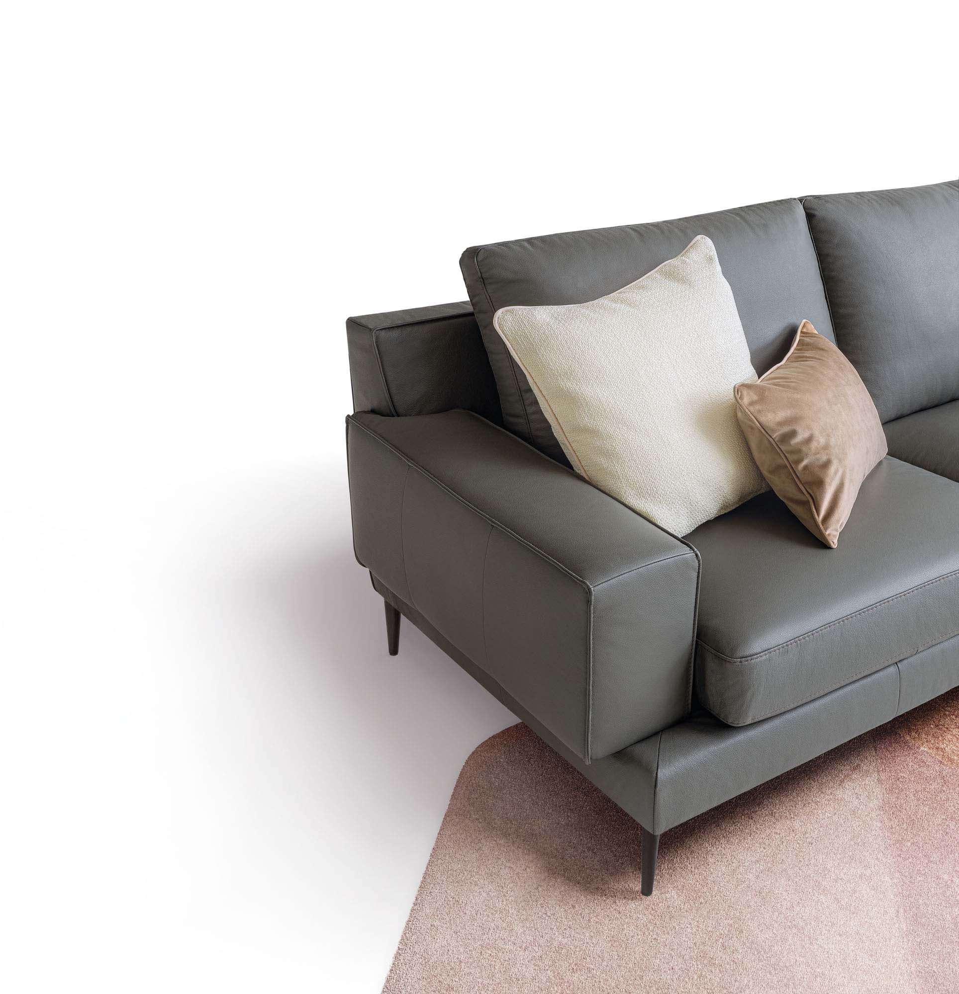 Leather sofa seat with wide armrest