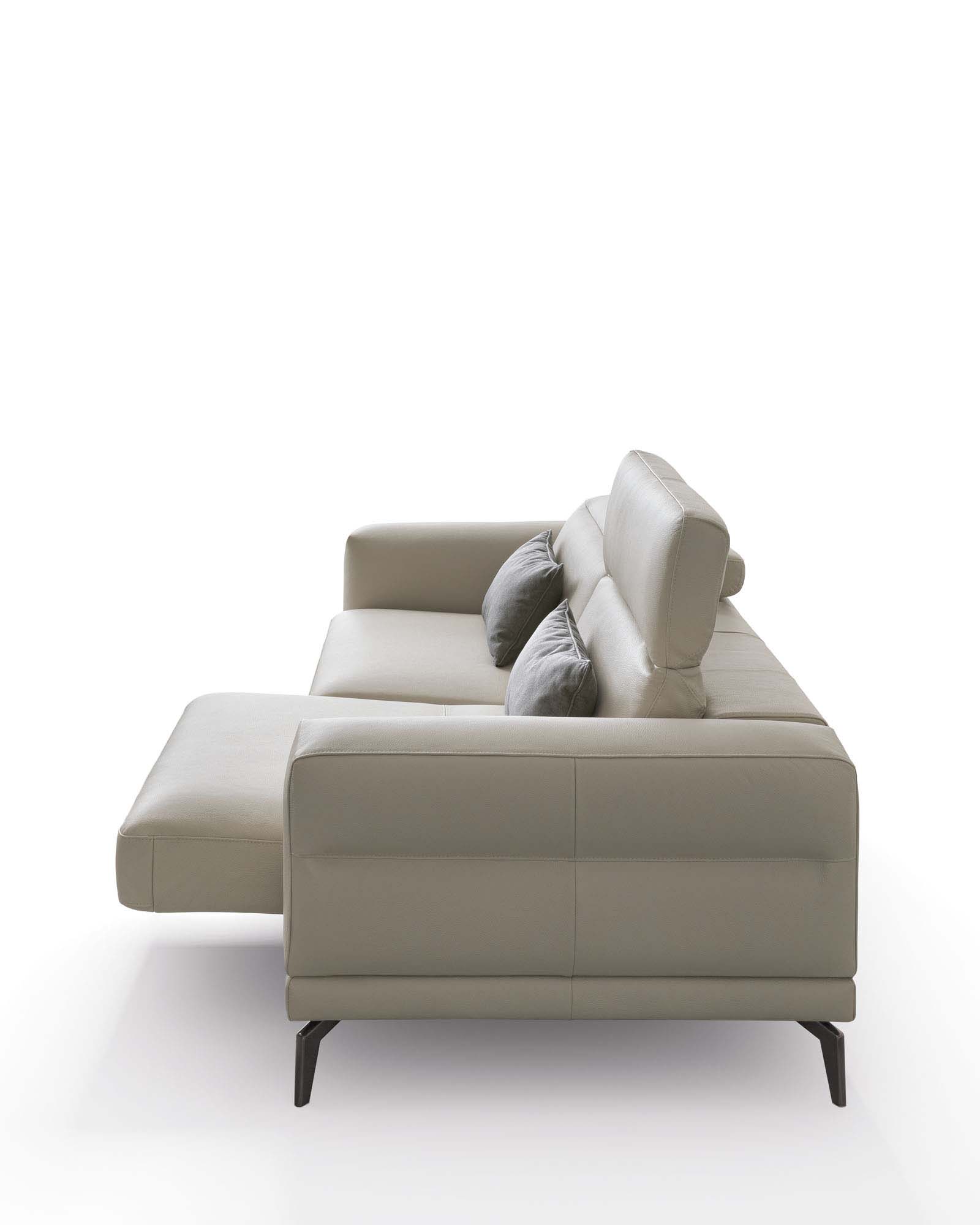 White leather sofa with sliding seat