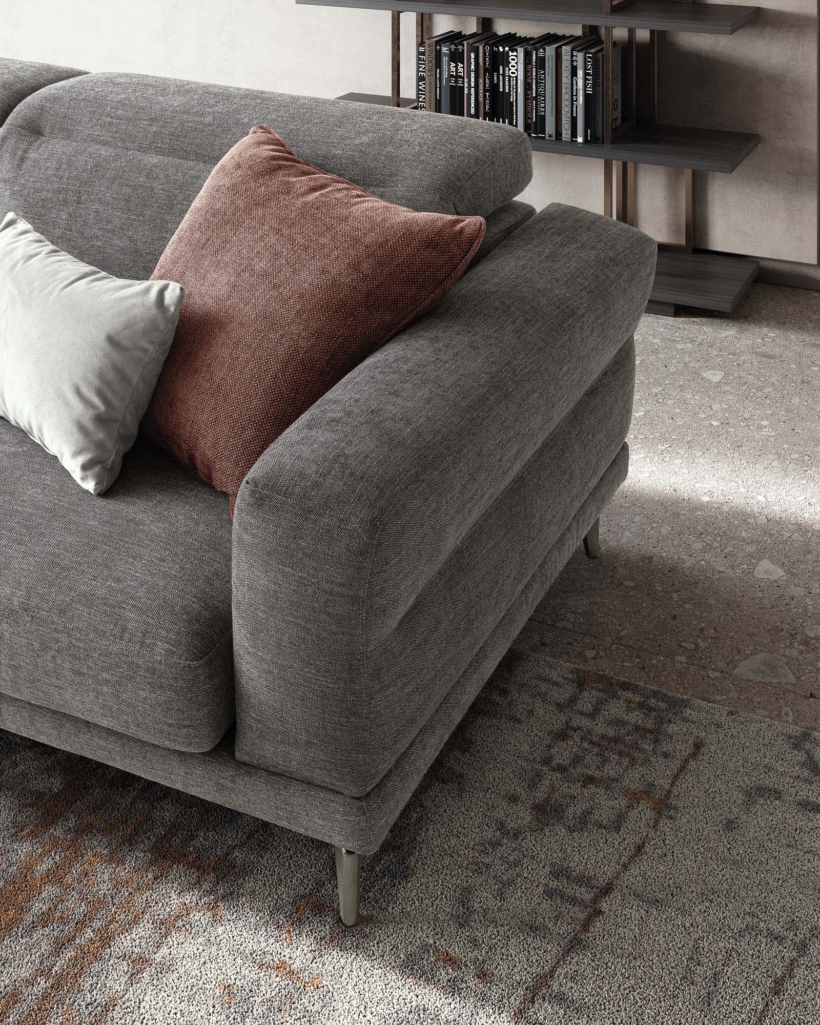 Detail of the leather armrest and modern legs