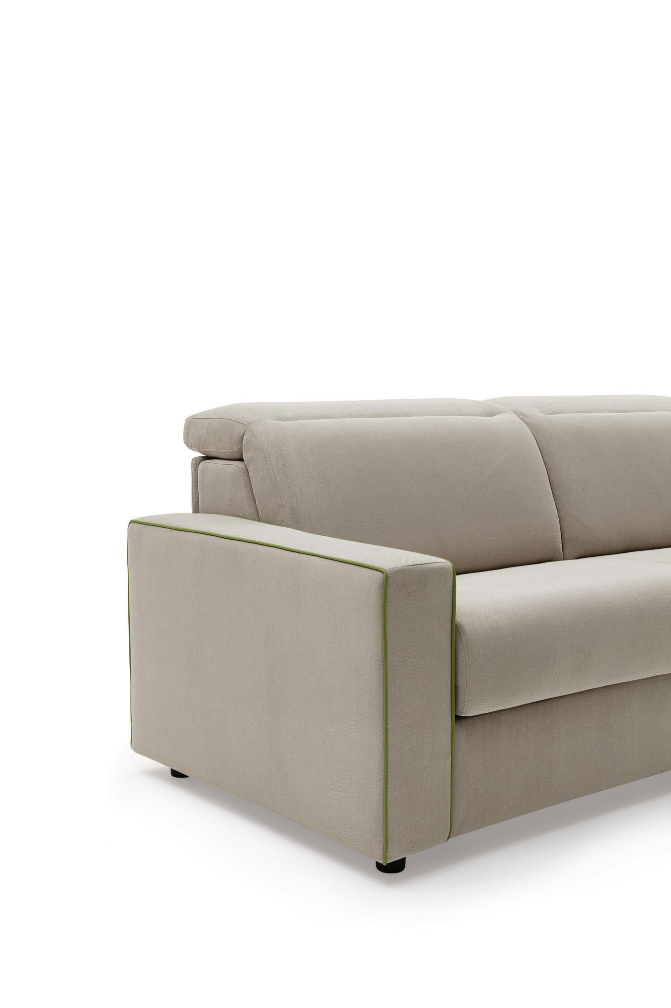 Detail of the Strong armrest of the Barbados sofa bed: wide and squared shape for placing cell phone and remote control