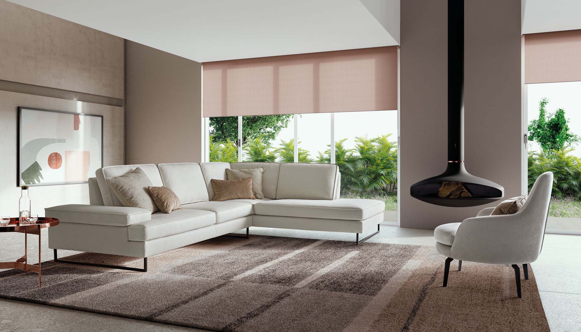 Bright living room with fireplace furnished with a white fabric sofa