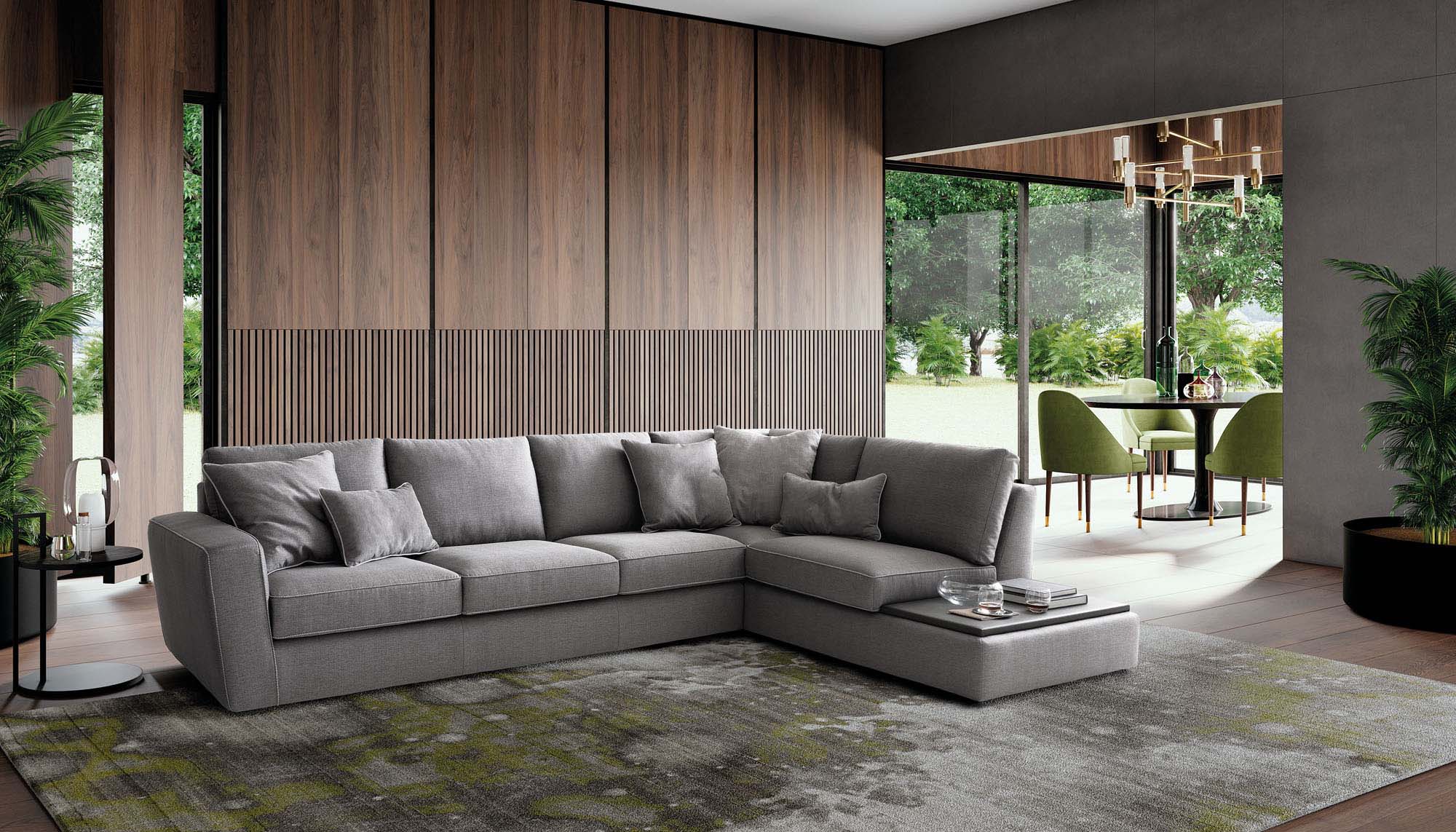 Large grey sofa with built-in side tray