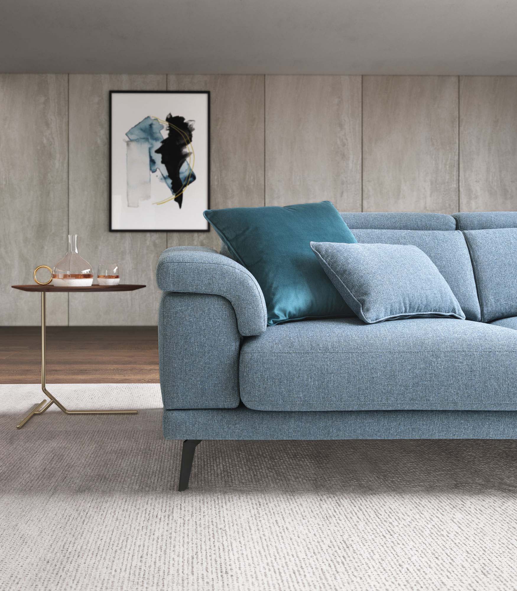 Seat detail of a comfortable sofa with adjustable low backrest.