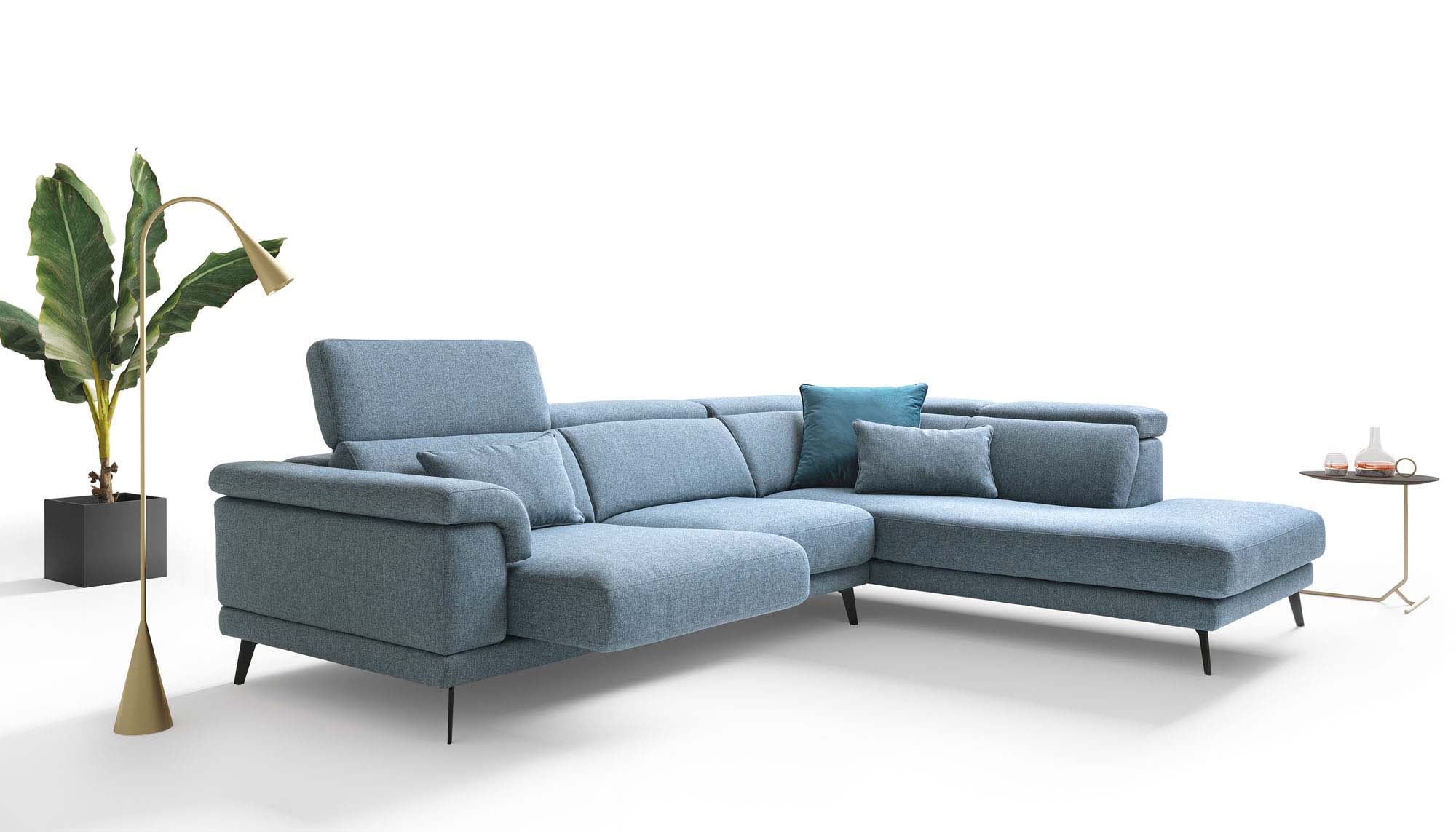 Light blue sofa with chaise longue, pull-out seat and adjustable headrest