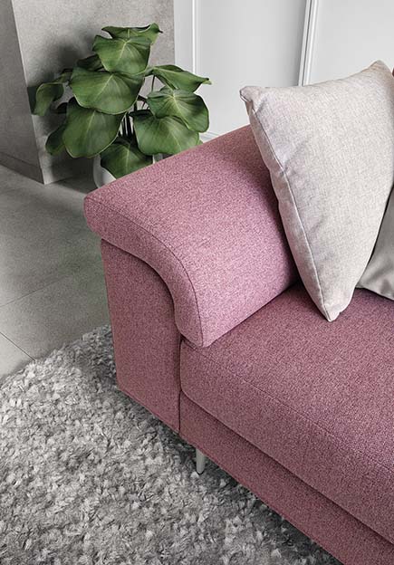 Detail of the rounded and comfortable armrest of a sofa
