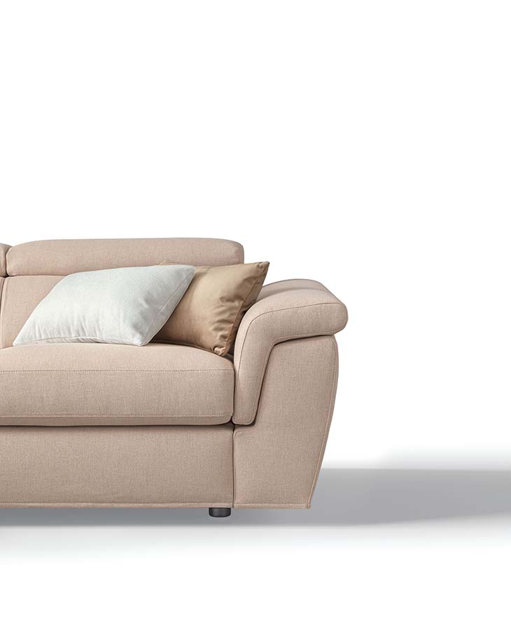 Detail of the rounded and comfortable armrest of a sofa with adjustable headrests