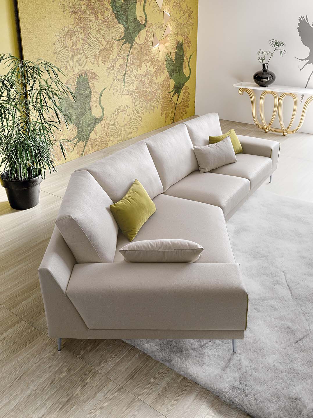 Sofa with wide armrests for placing remote control and cell phone. White color with contrasting edges