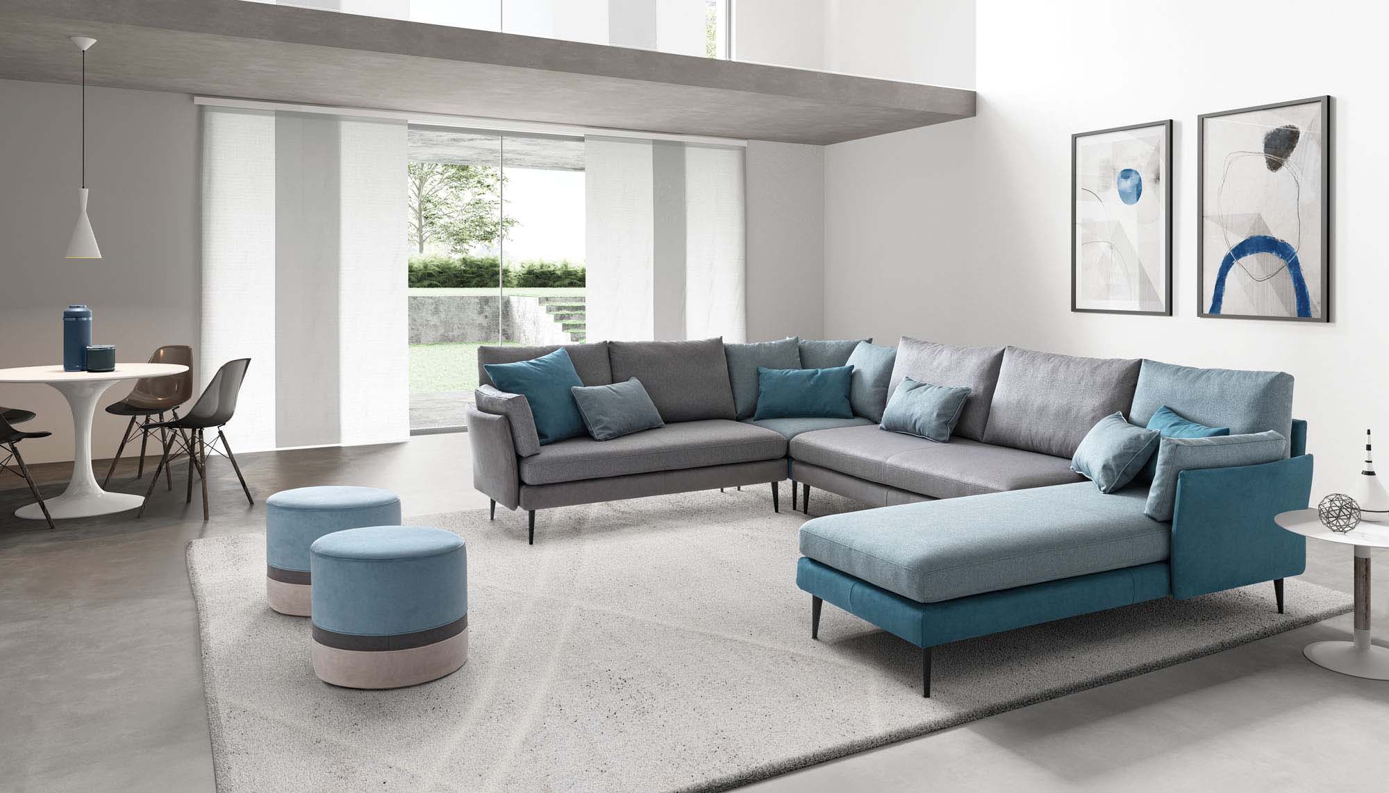 Living room furnished with a U-shaped sofa with peninsula and matching poufs.