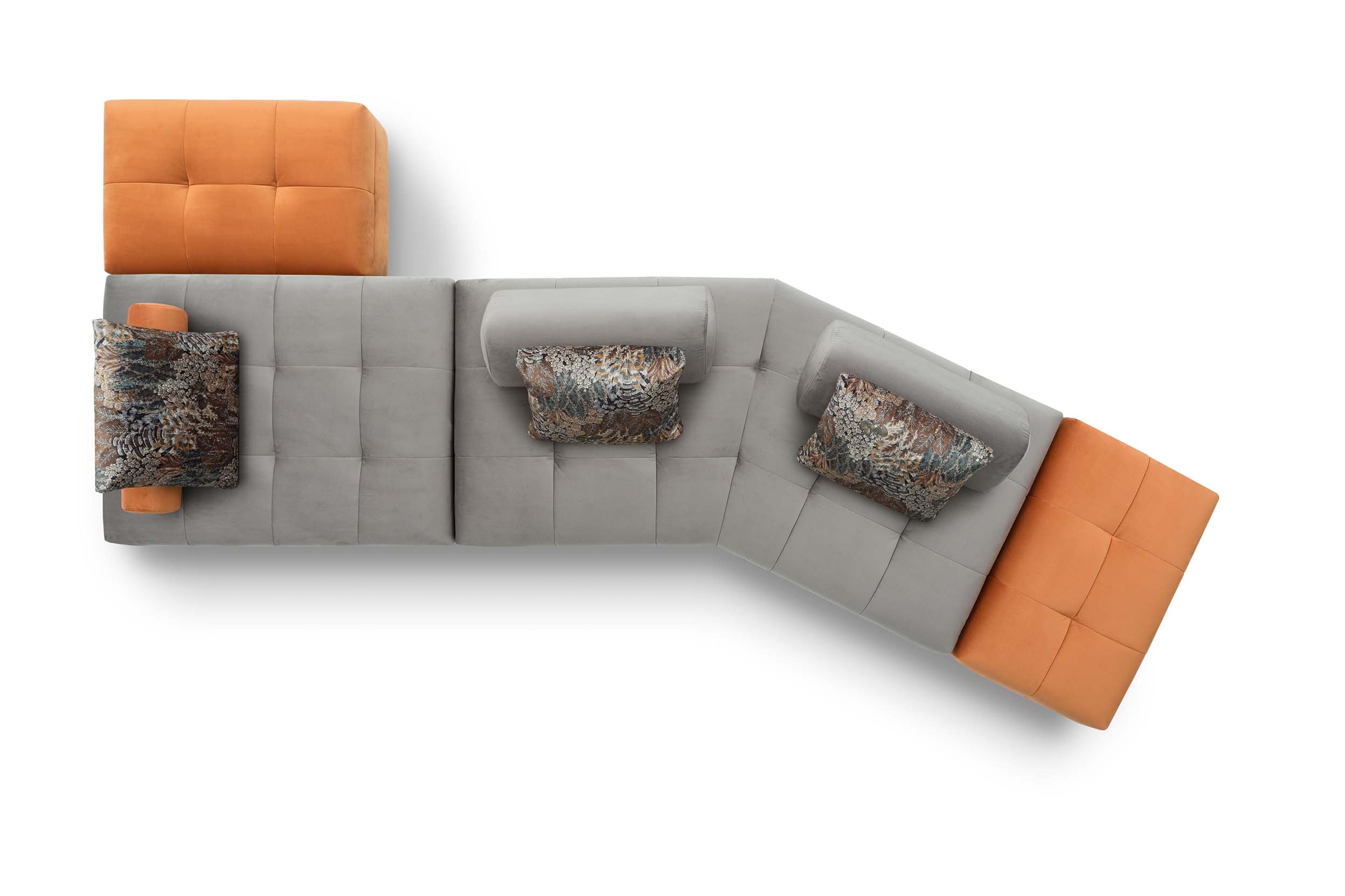 Reed Light modular sofa with low legs and space-saving design. Central asymmetrical seat and side poufs.