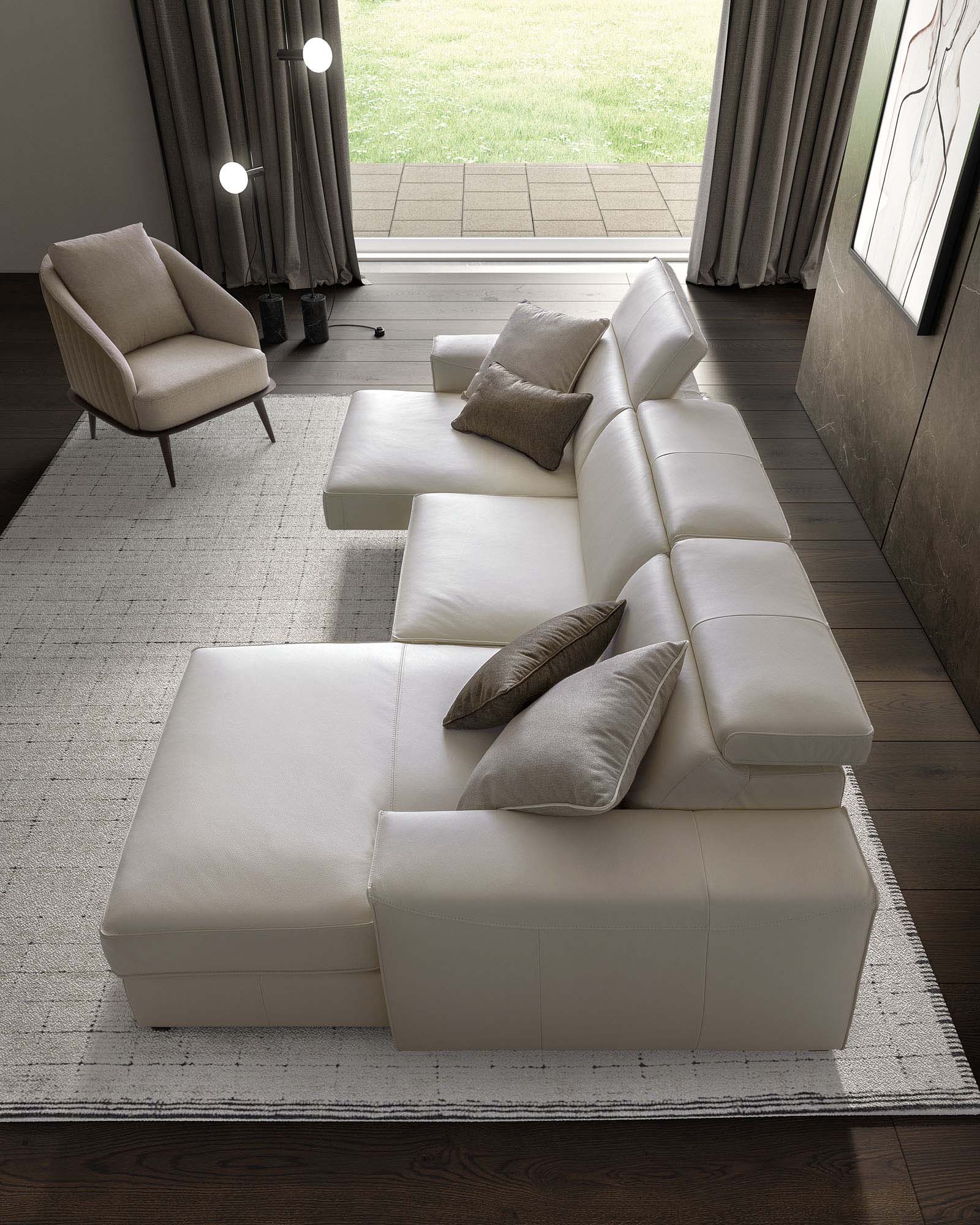 White leather sofa with extendable seat and fixed chaise