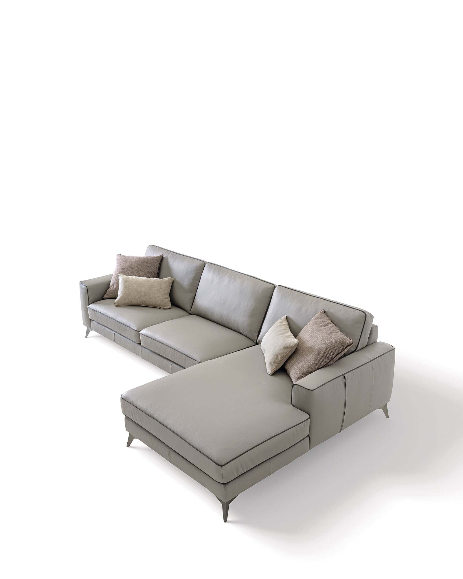 Modular sofa with a large gray chaise and contrasting trim