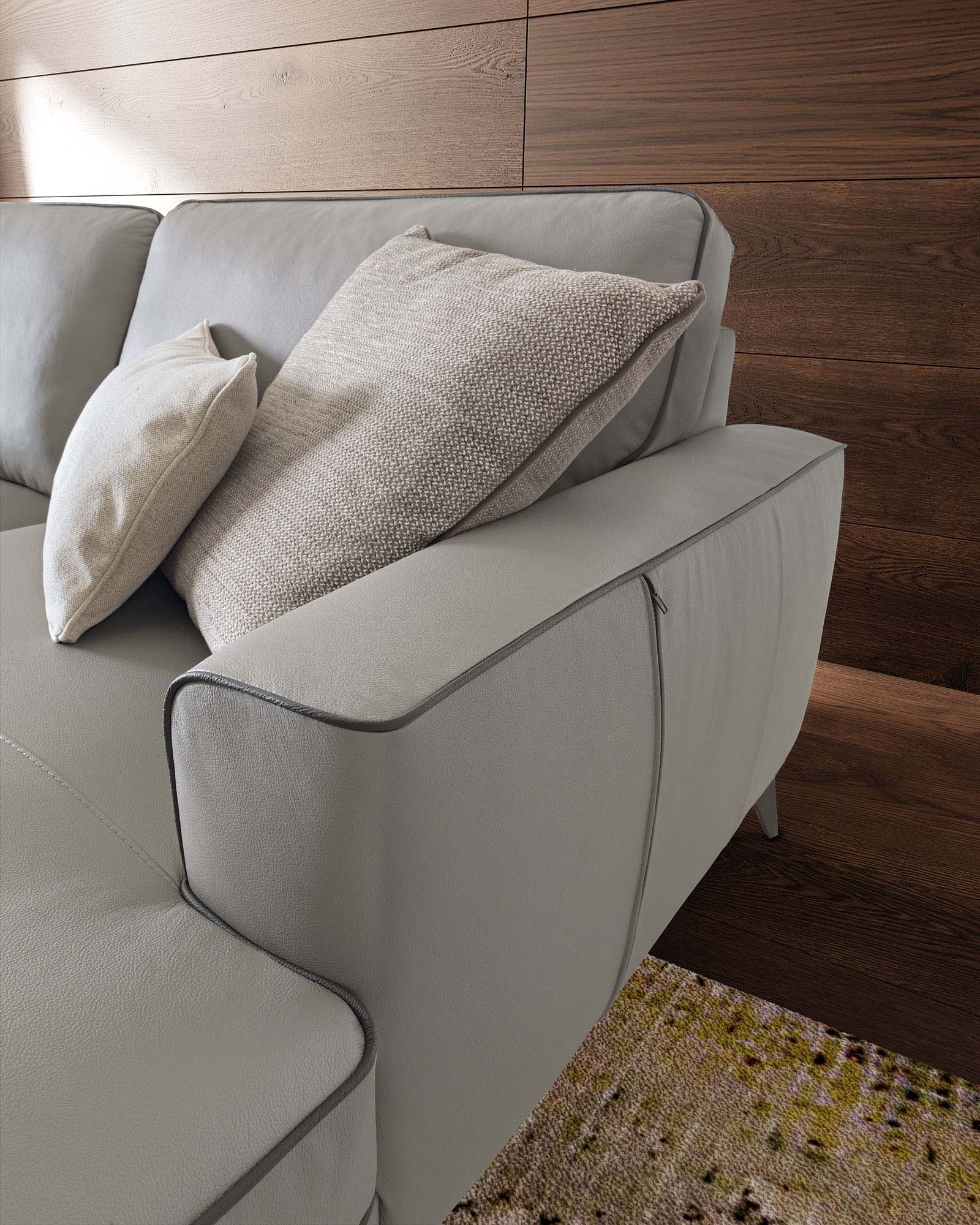 Sofa with armrest featuring a side zip storage compartment