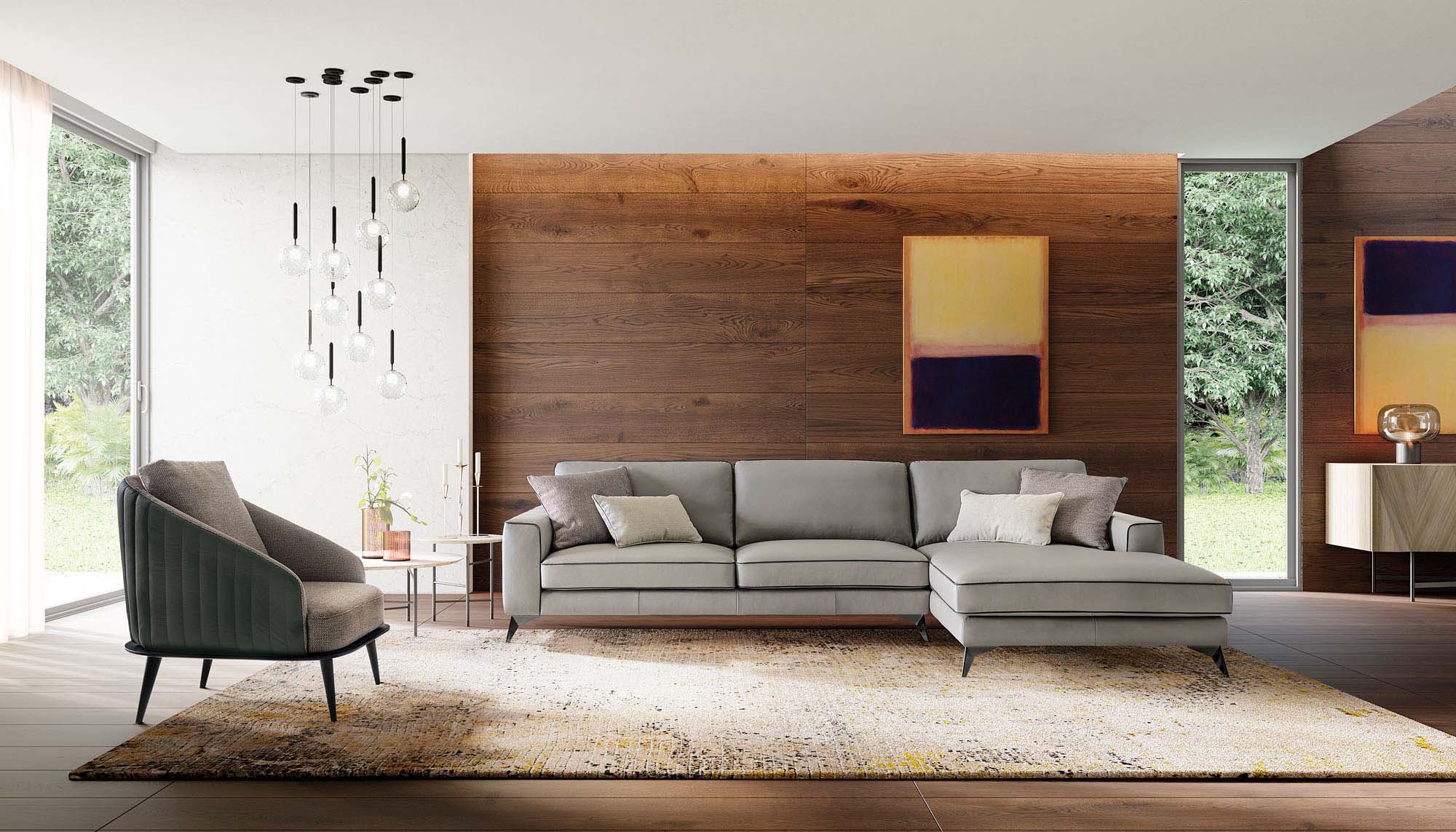 Living room furnished with a large gray leather chaise sofa