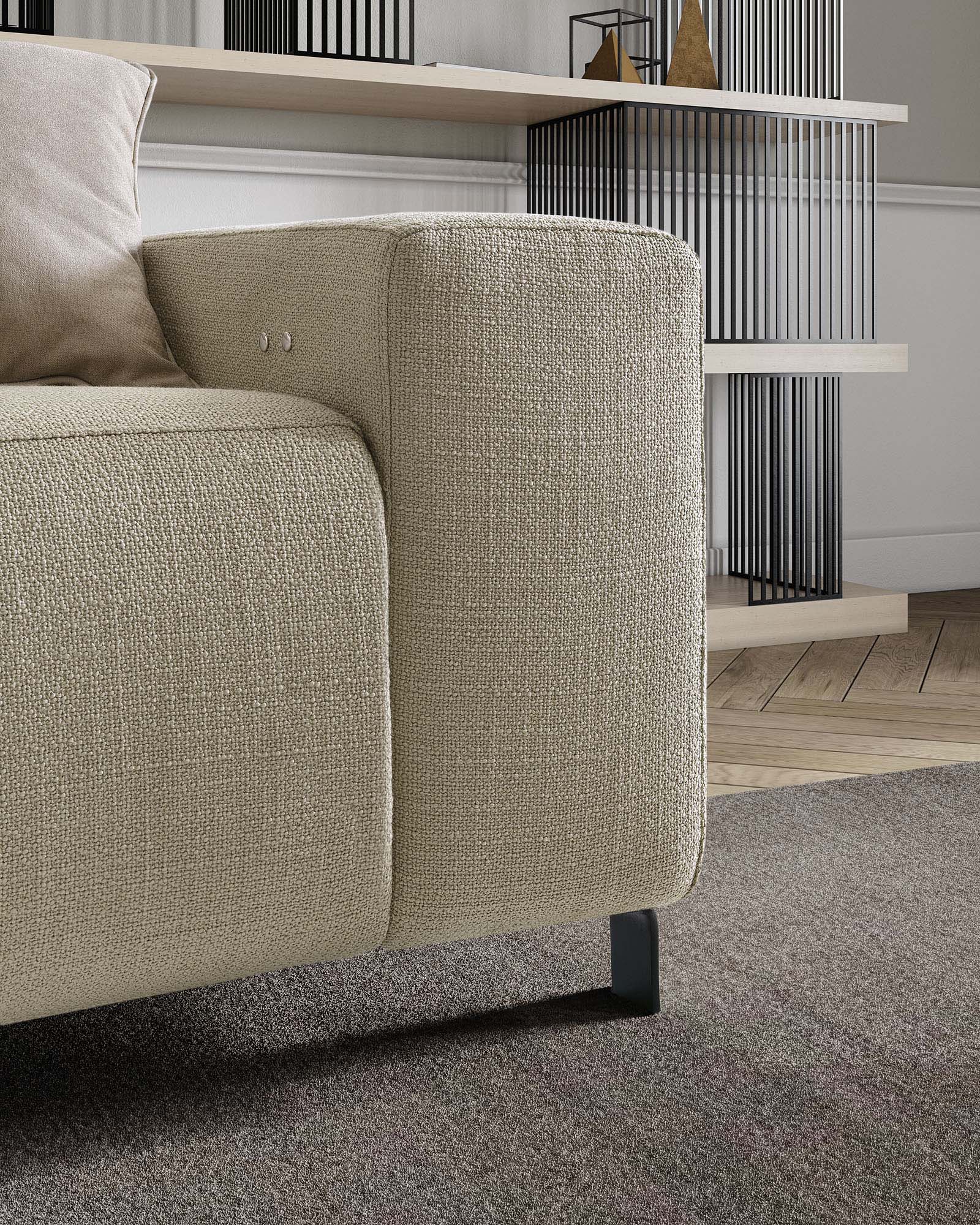 Close-up of the armrest with buttons for the recliner mechanism