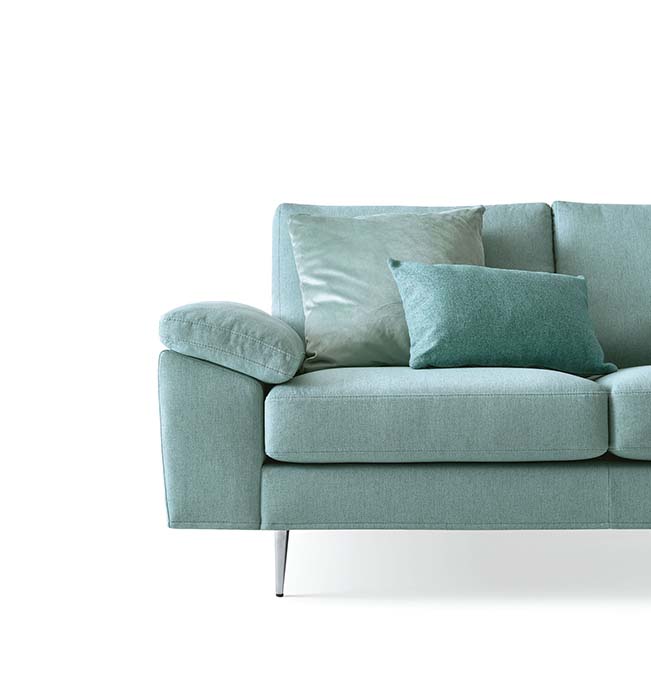 Detail of the seat and upholstered armrest of the Sfinge sofa