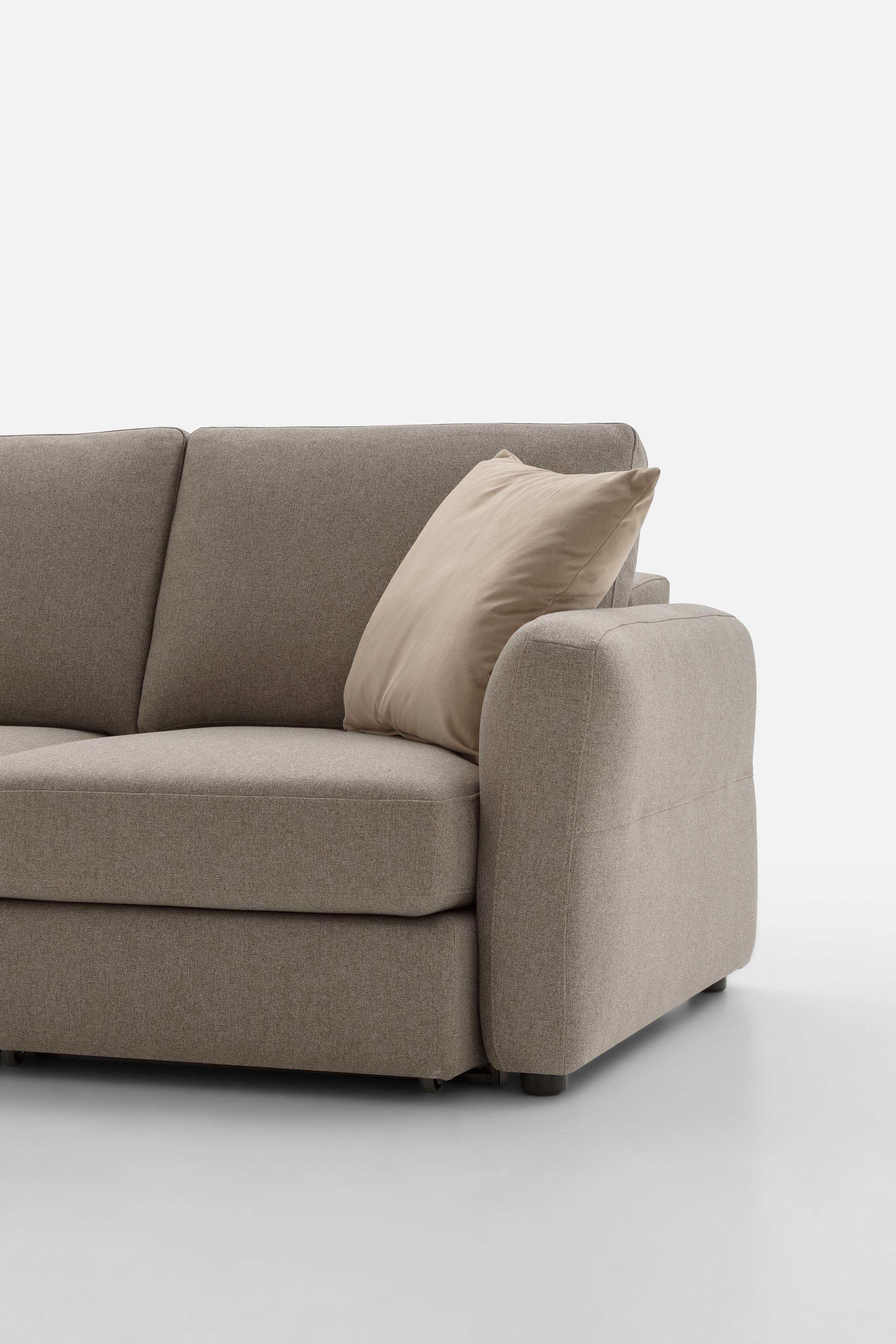 Detail of a linear sofa with a 'Cio' model armrest