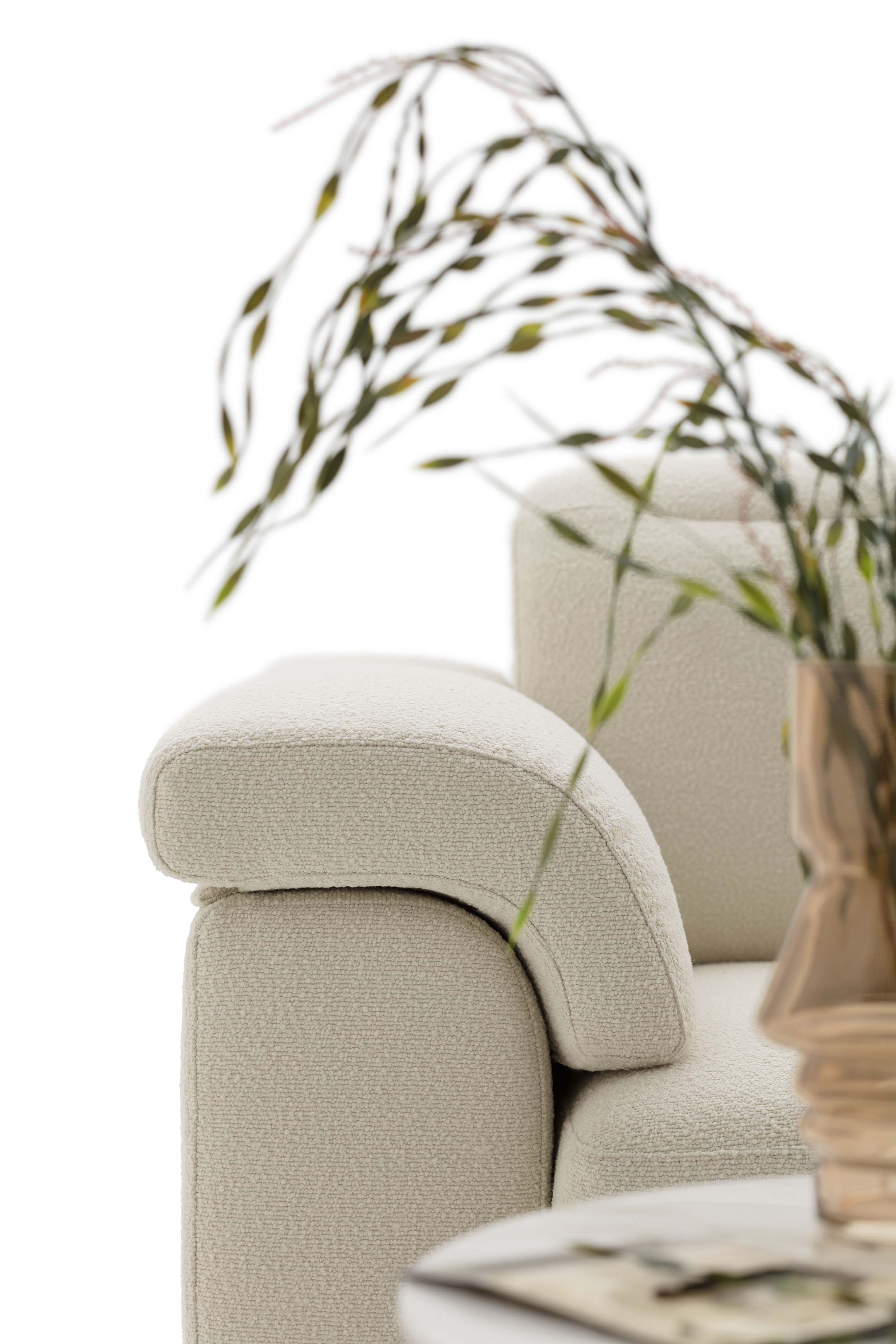 Detail of the Ali armrest by LeComfort.