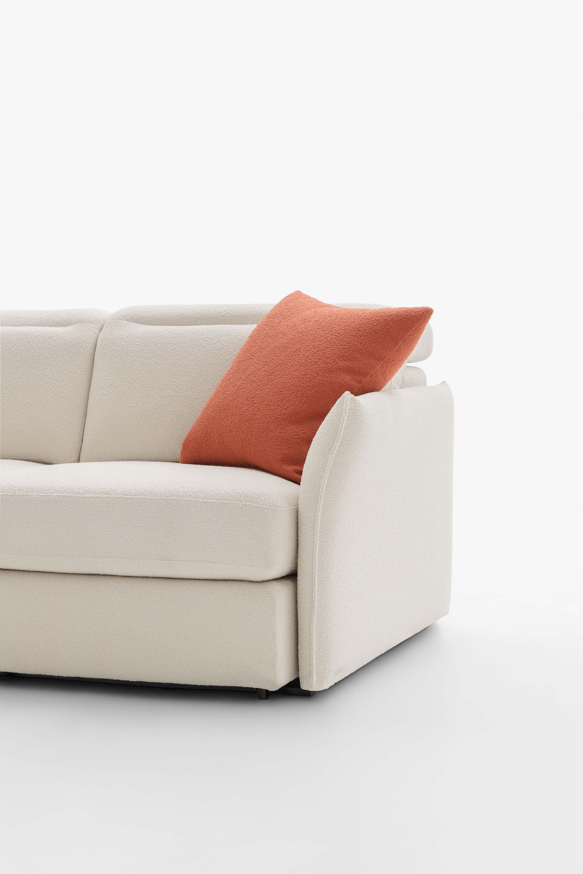 Drai armrest by LeComfort, slender and thin yet sturdy with raised piping.