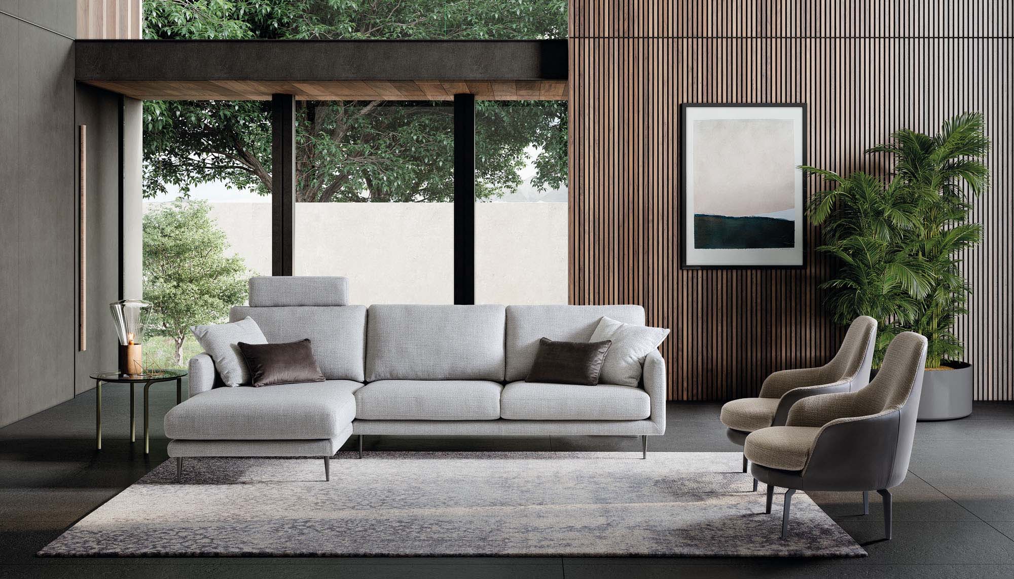 Chaise lounge sofa in white-silver fabric with added headrests.