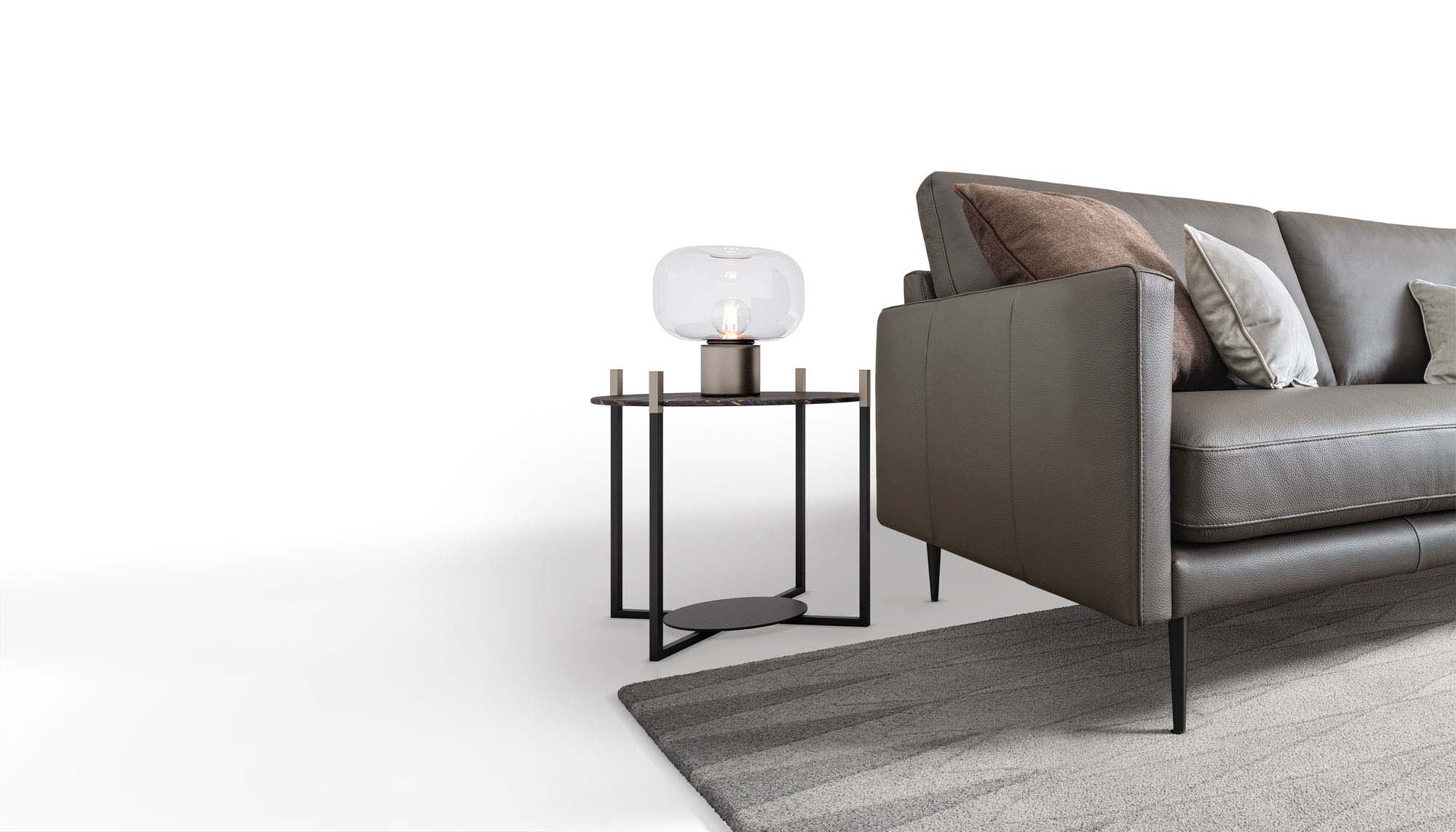 Elegant sofa with high and slim designer legs