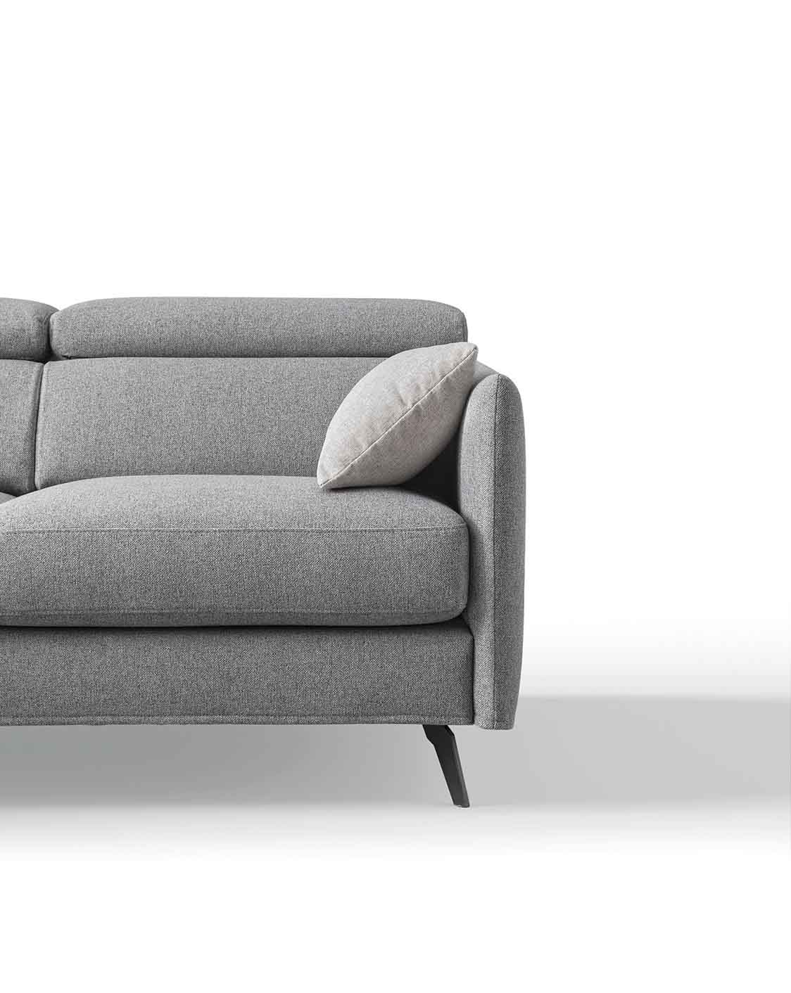 Detail of the legs and seat of a modern grey sofa