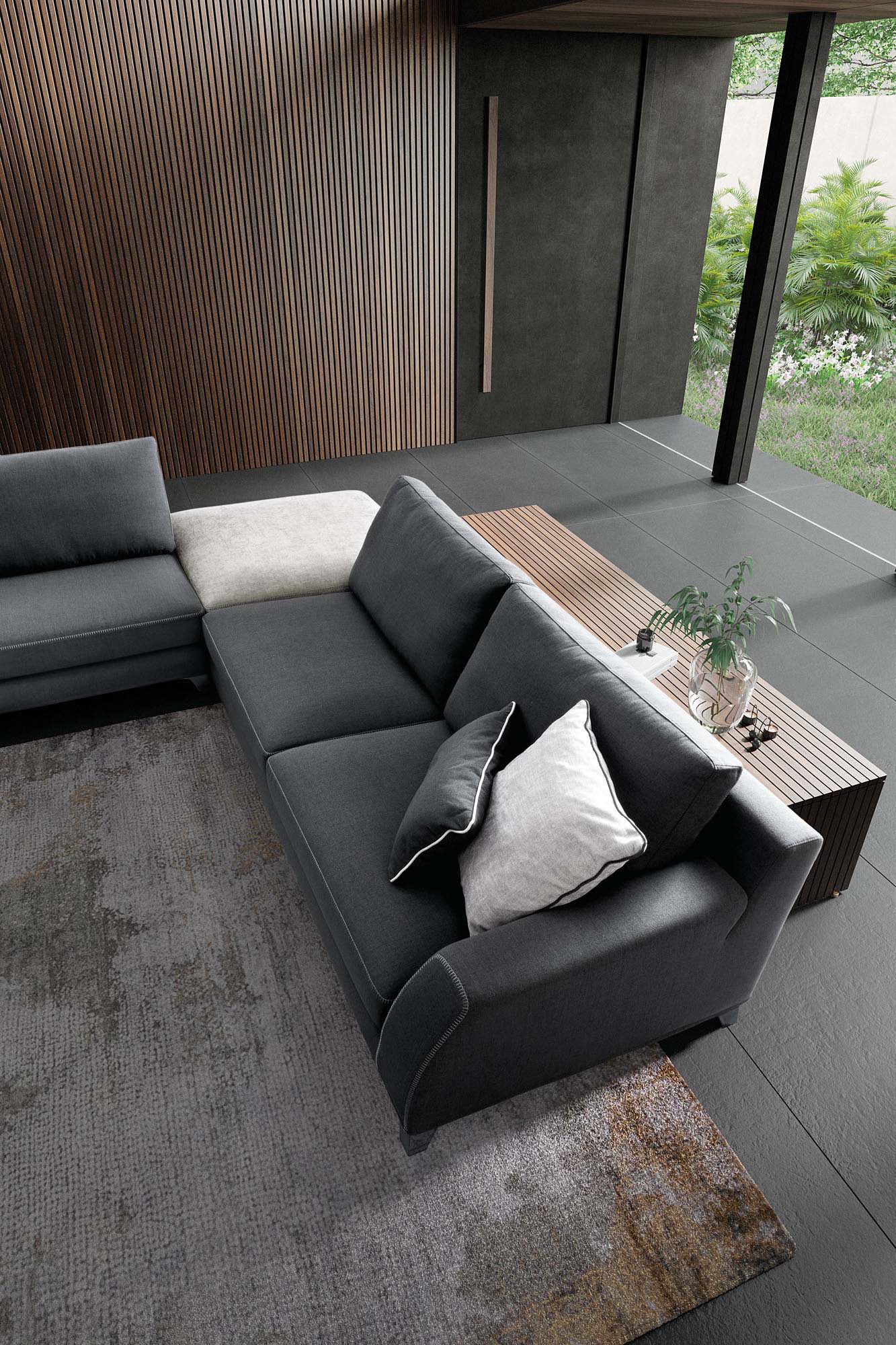 Two-tone modular sofa in dark gray and white-silver.