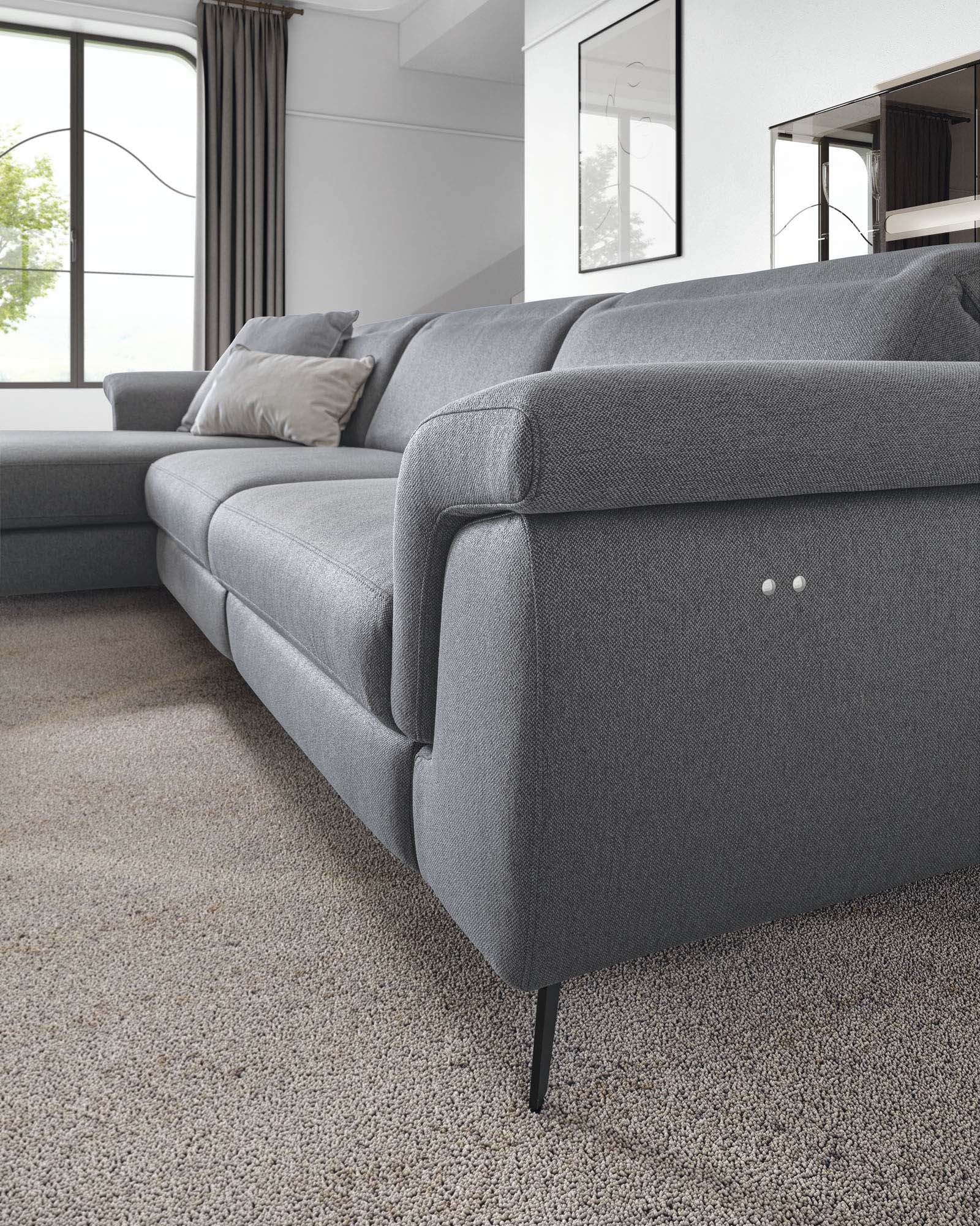 Close-up of the buttons that activate the LeComfort recliner mechanism.