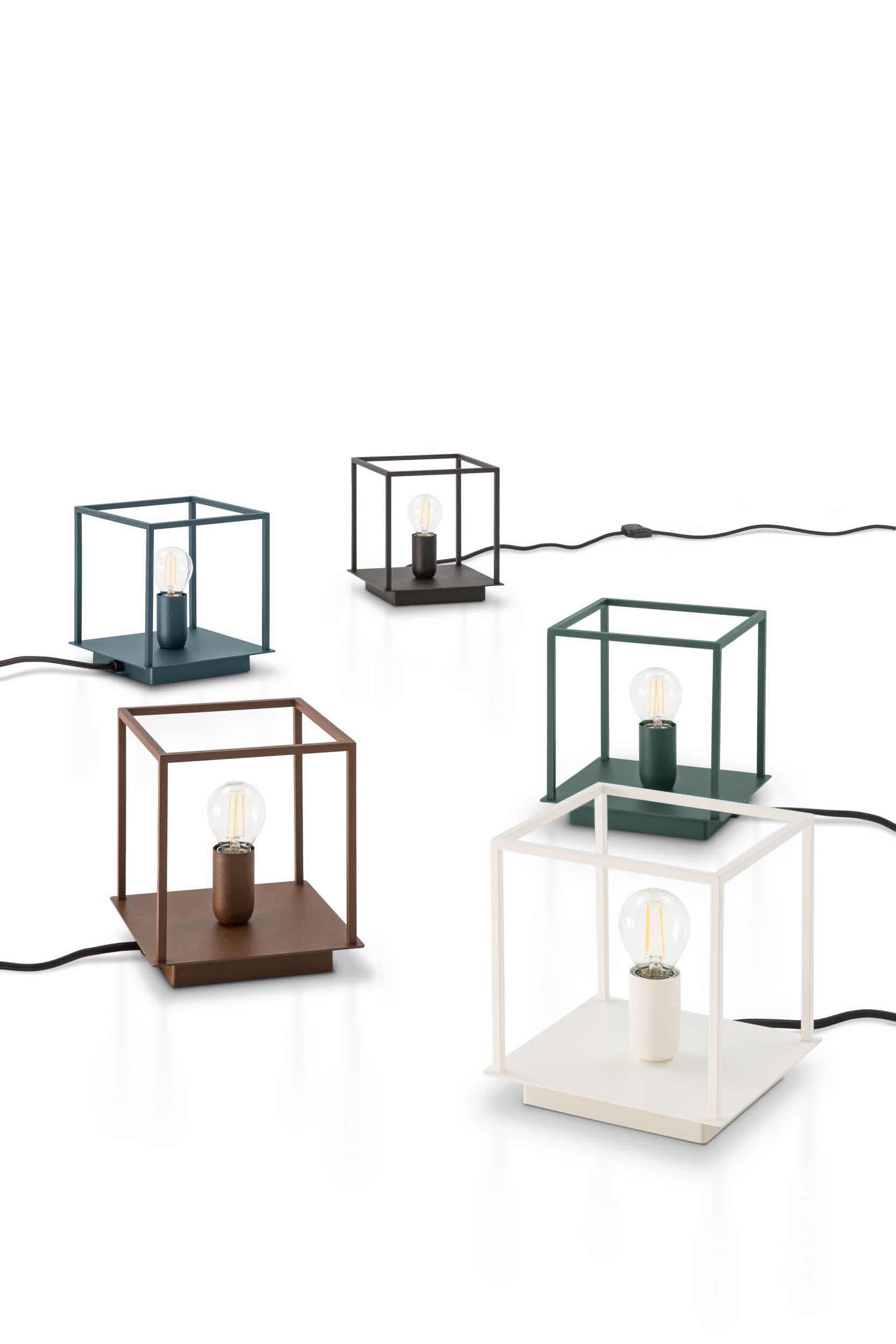 Various versions of cage-style table lamps in different colors.