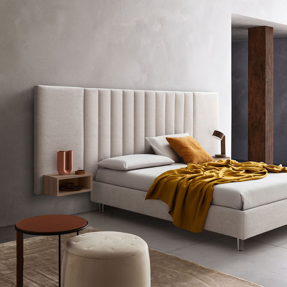 Elegant Contract Bed Contract bed with a white upholstered headboard for an elegant and refined suite.