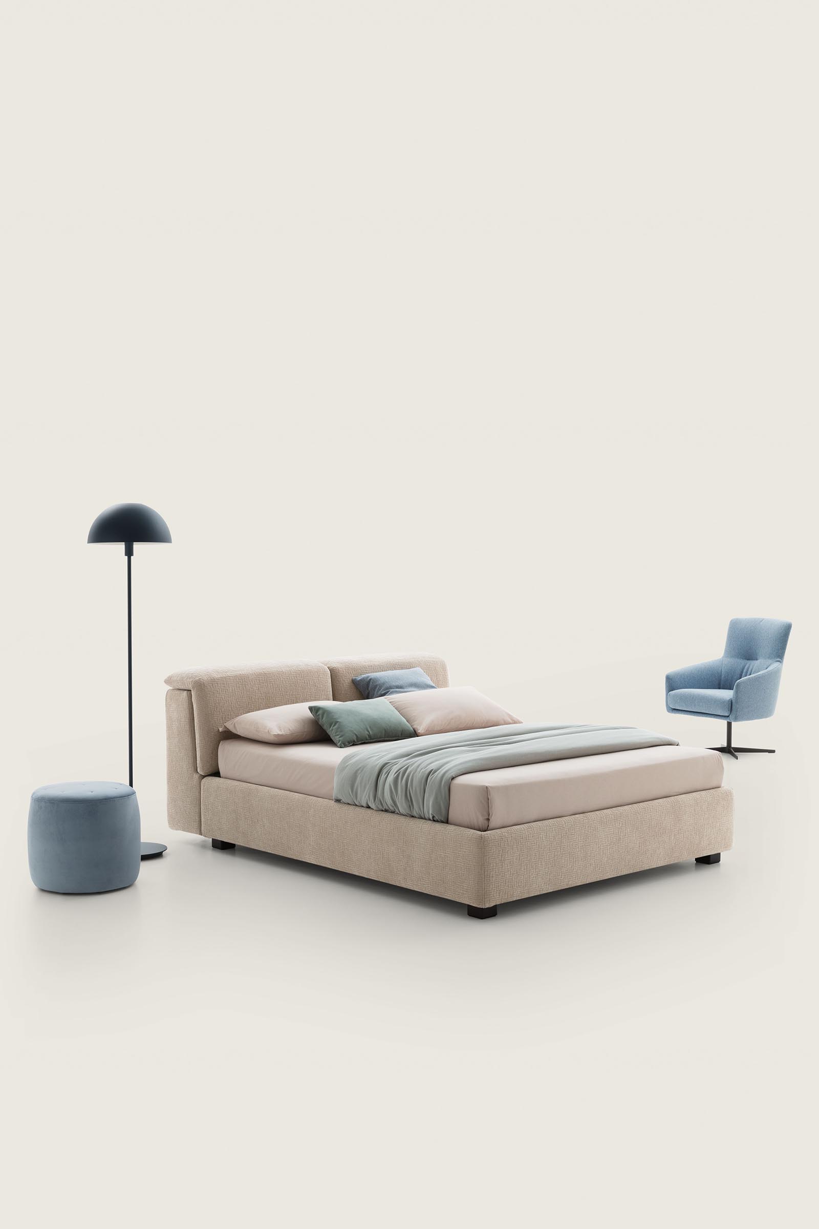 Cream-colored bed with low feet and high bed frame. Upholstery with particular textures